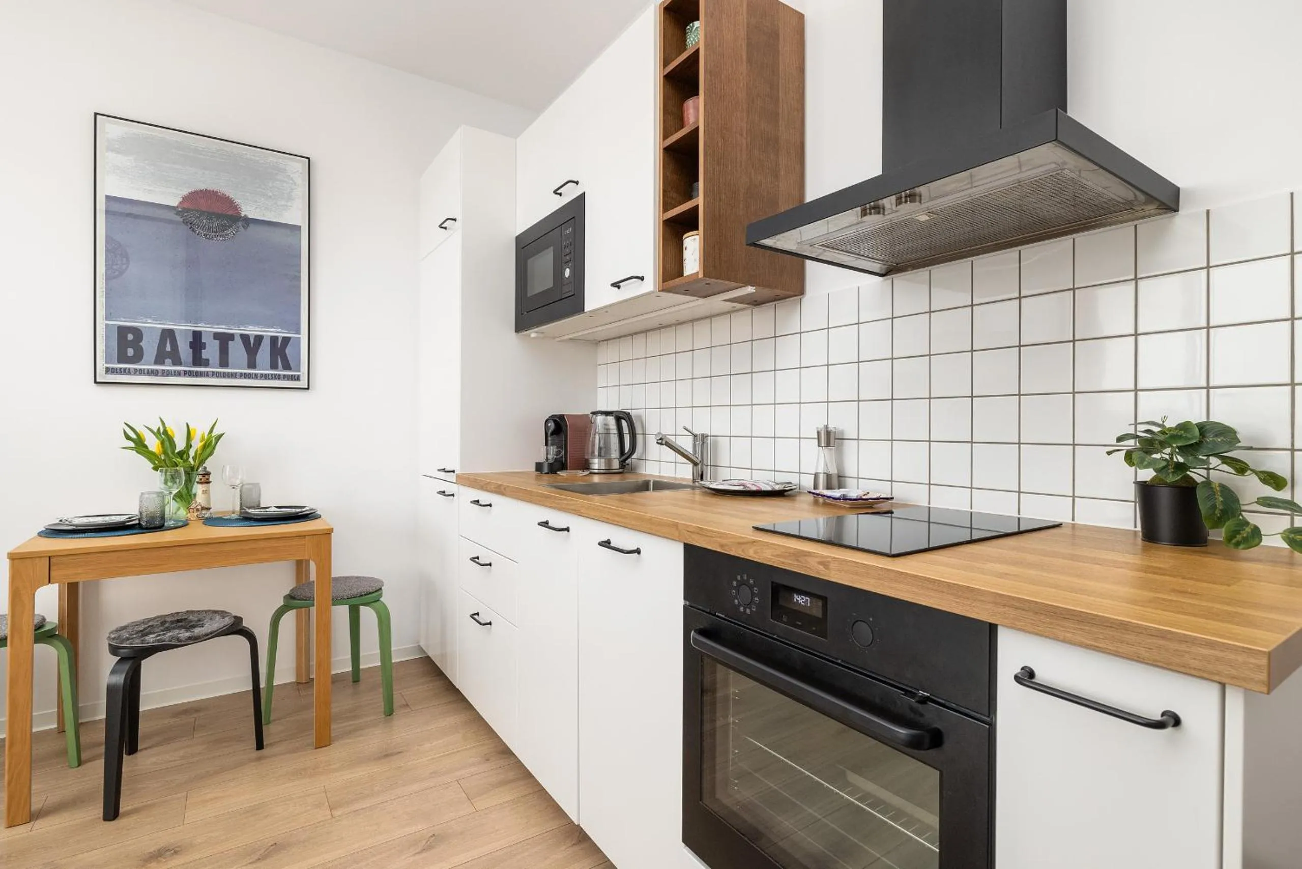 Kitchen or kitchenette in Szprotka Apartment with Air-Conditioning & Parking by Noclegi Renters
