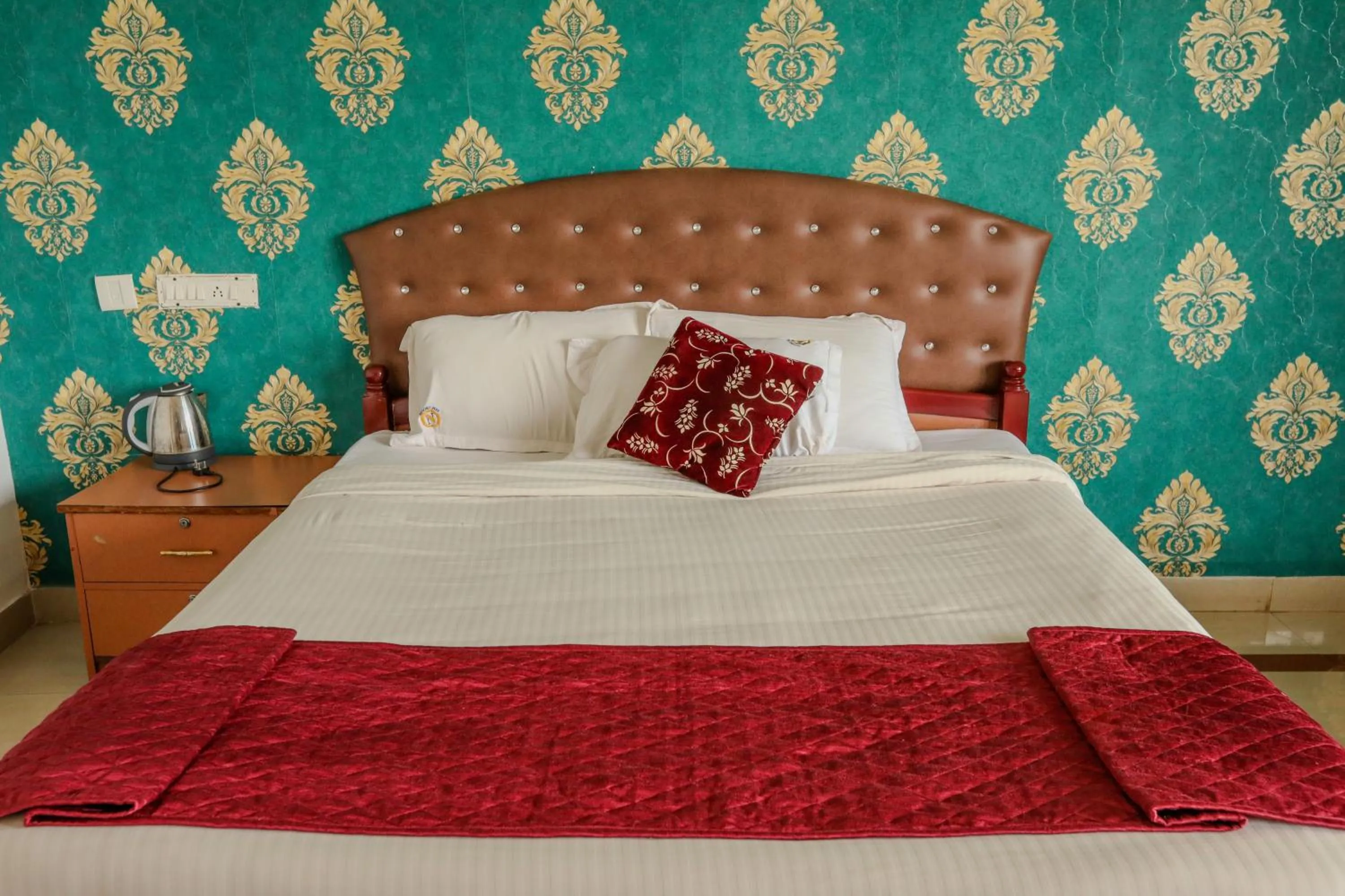 Bed in Thavika O Nila Resort & Convention Centre