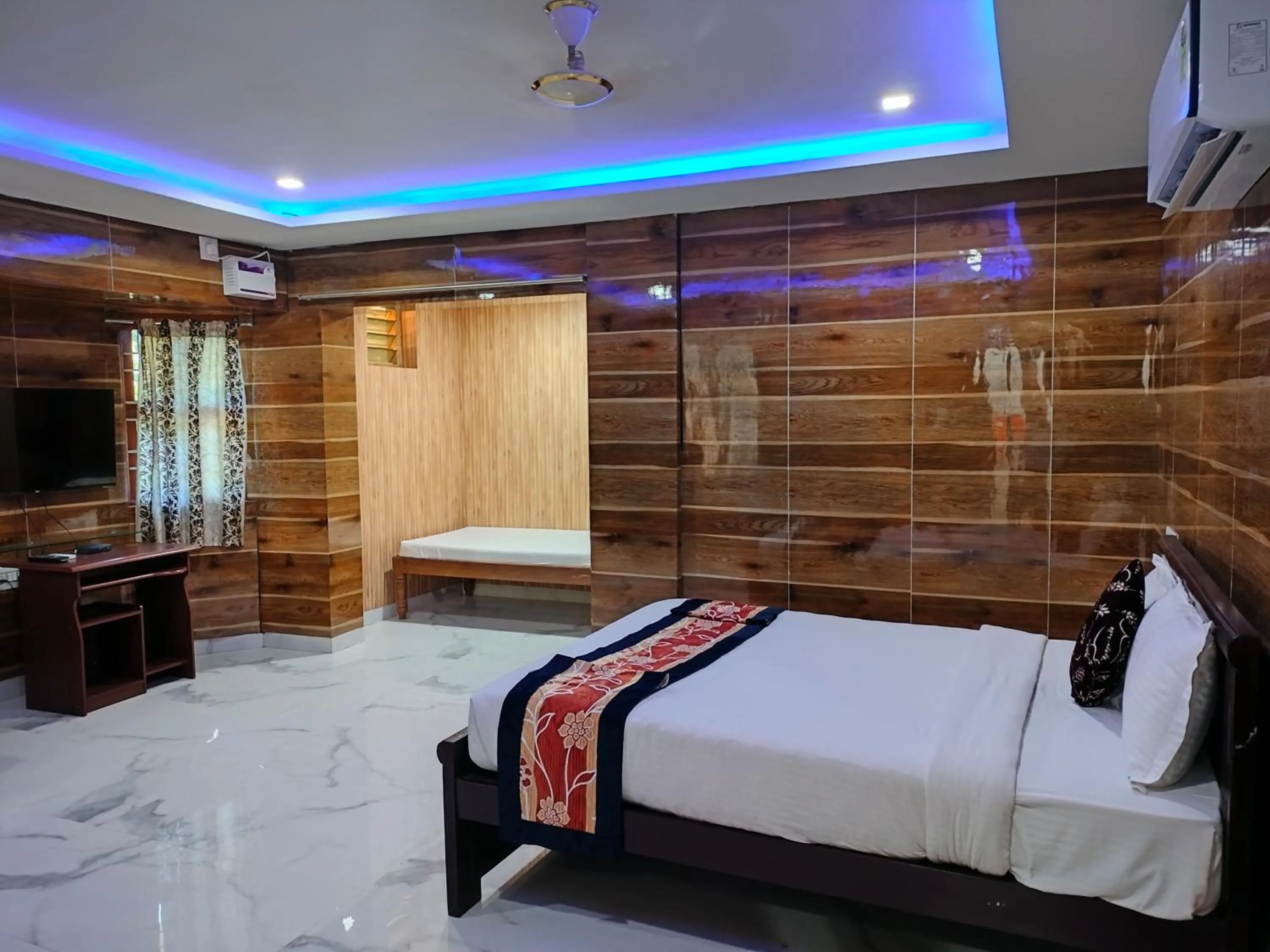 Bed in Thavika O Nila Resort & Convention Centre