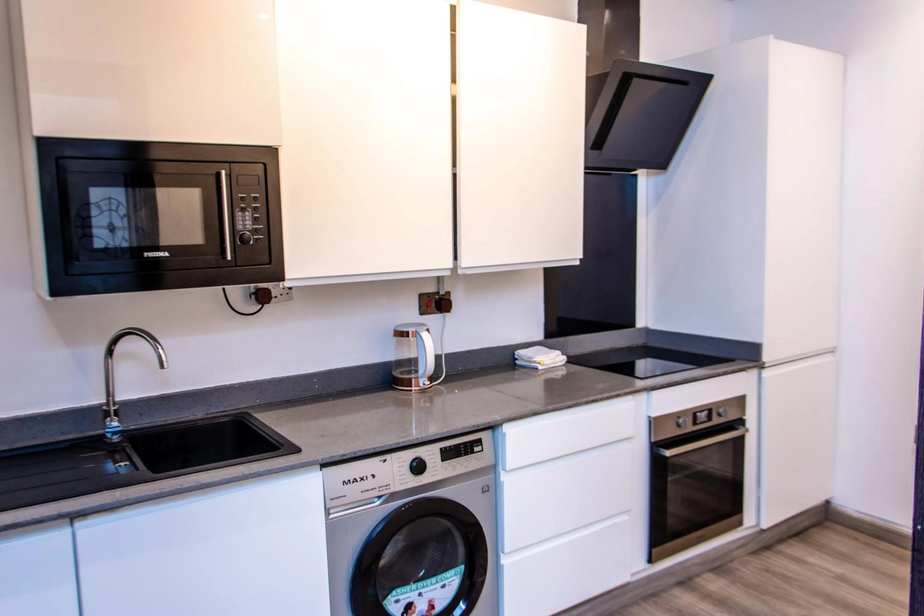 Kitchen or kitchenette in George Residence Lekki, Lagos - with Pool