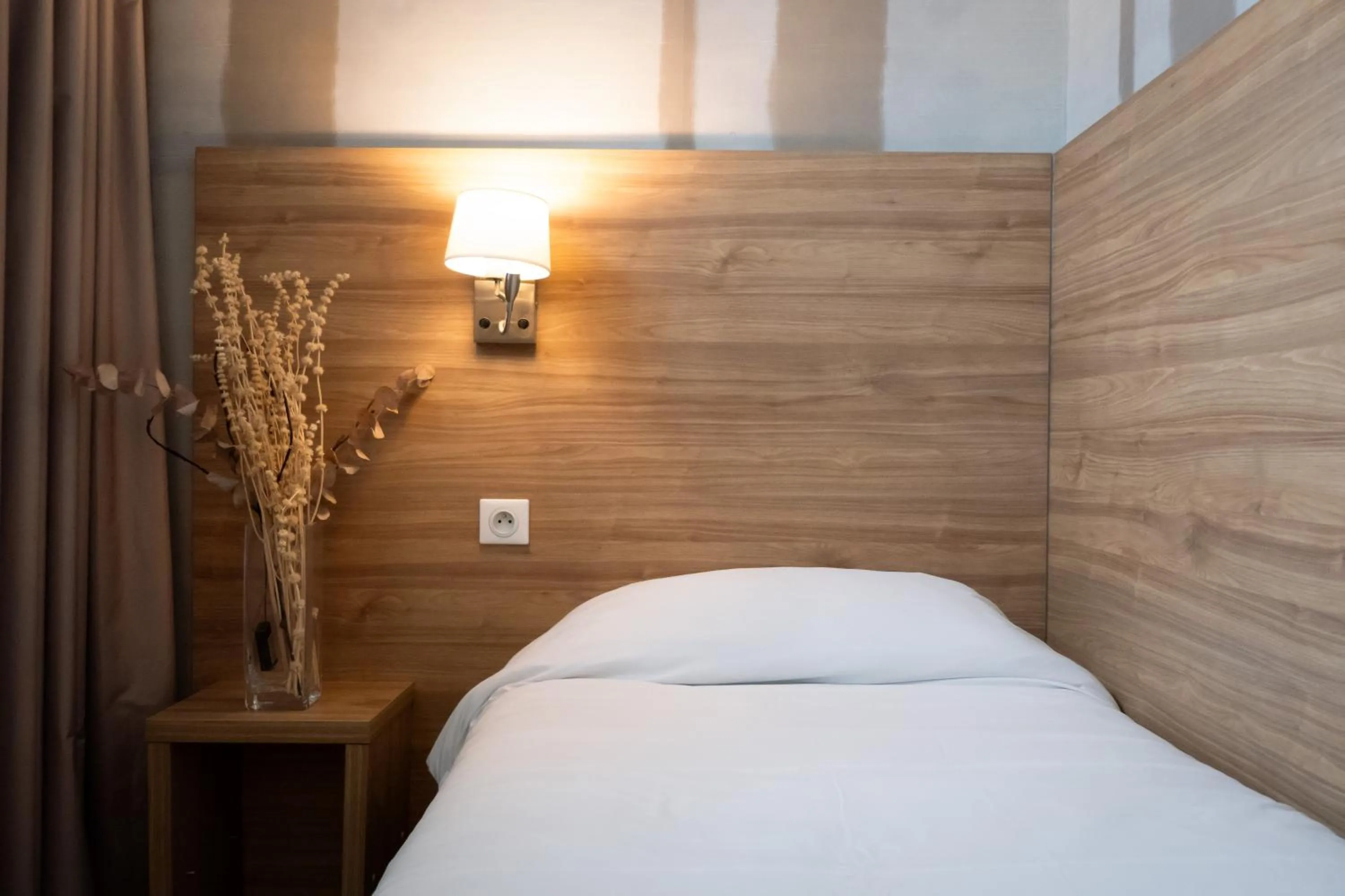 Bed in Hôtel de la gare