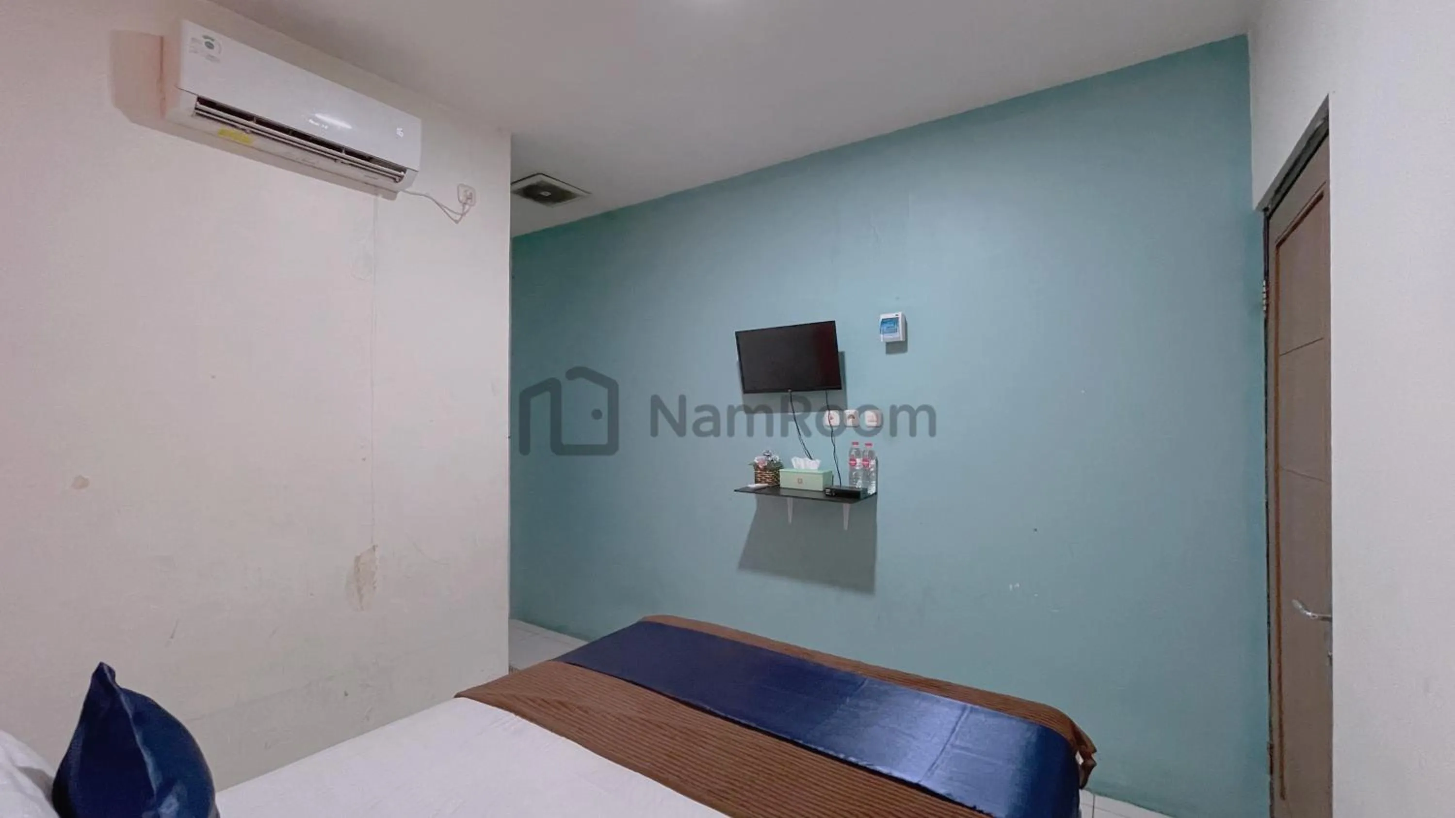 Bed in Cempaka Residence By NamRoom