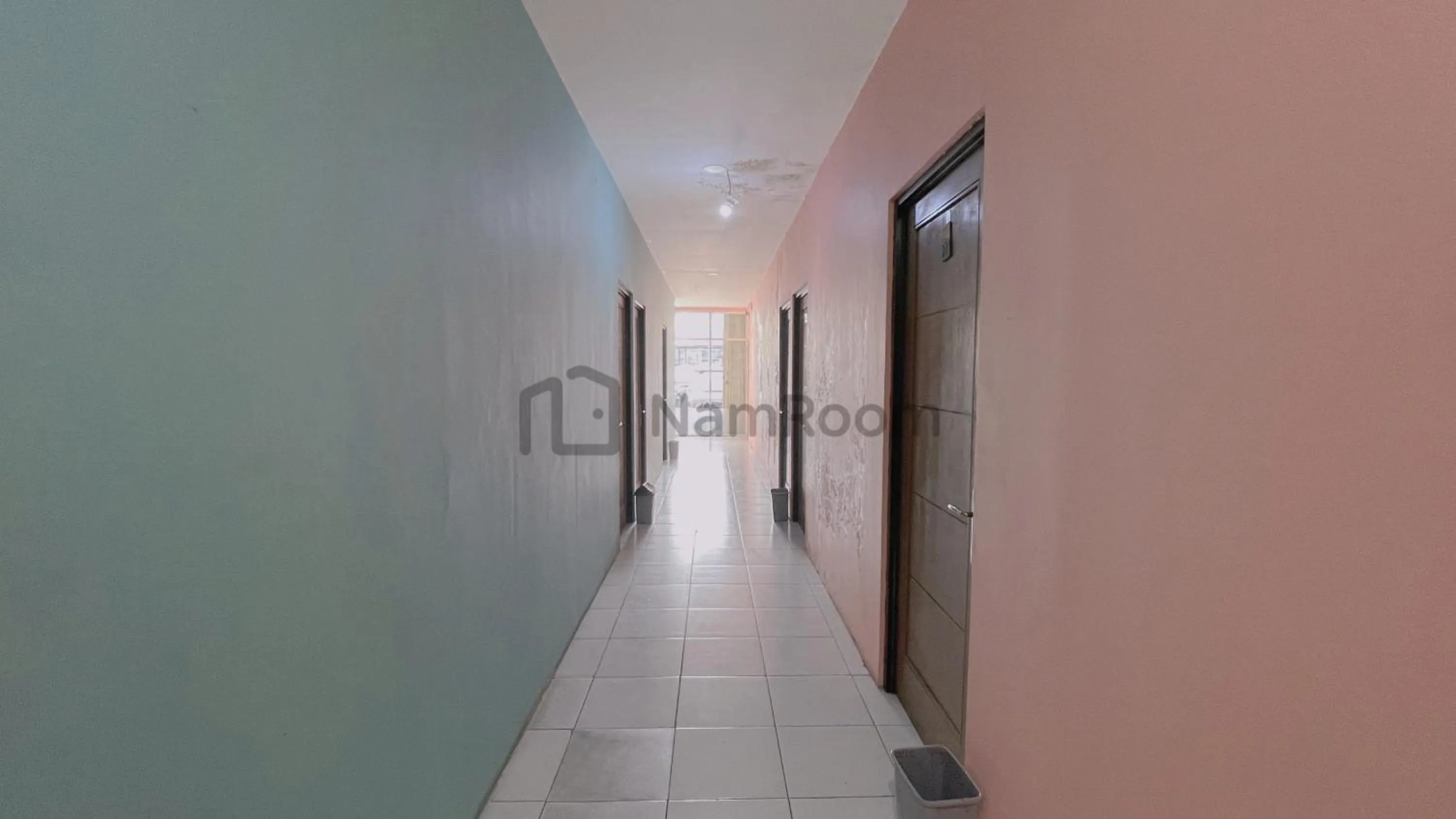 Living room in Cempaka Residence By NamRoom