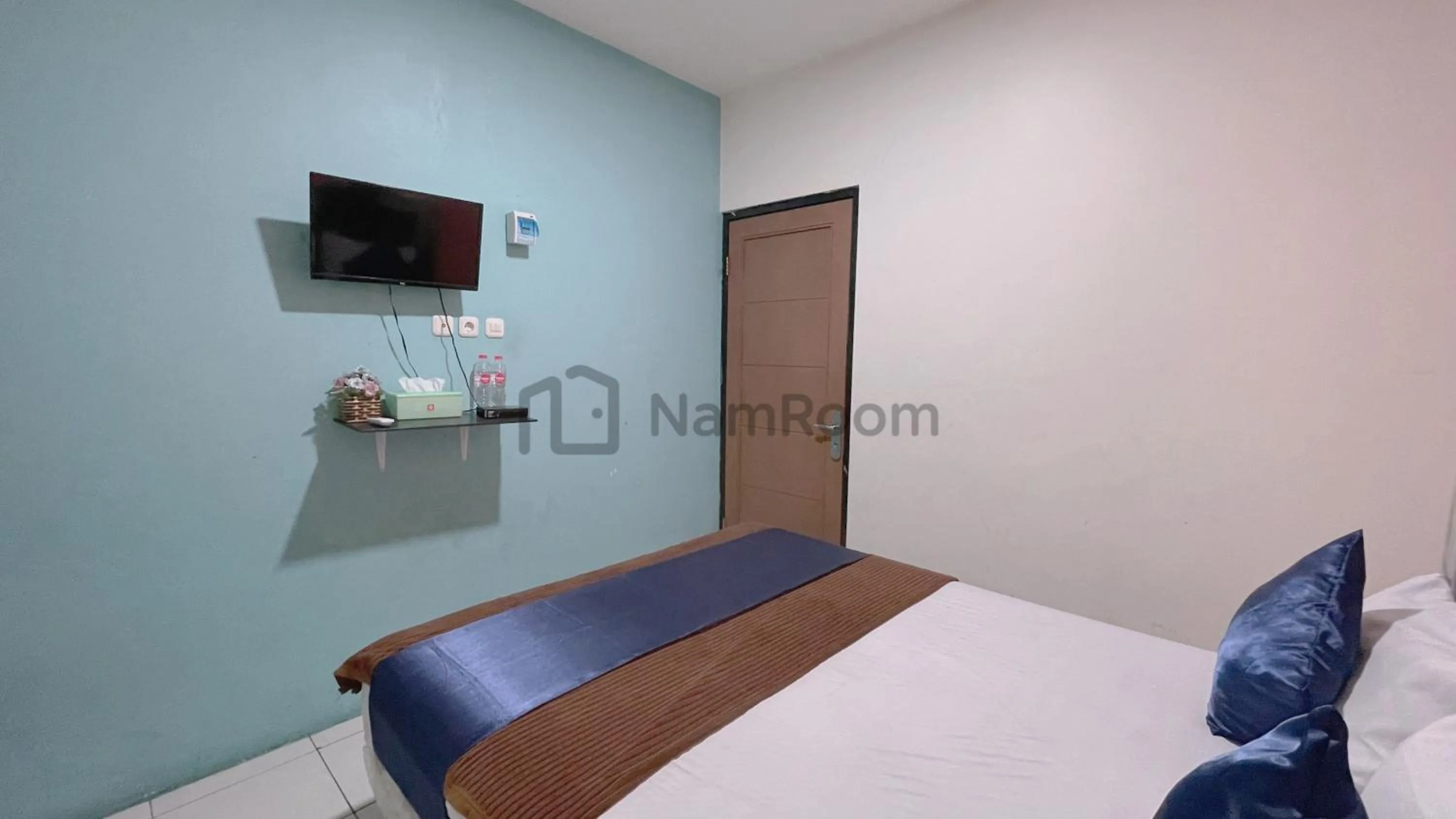 Bed in Cempaka Residence By NamRoom