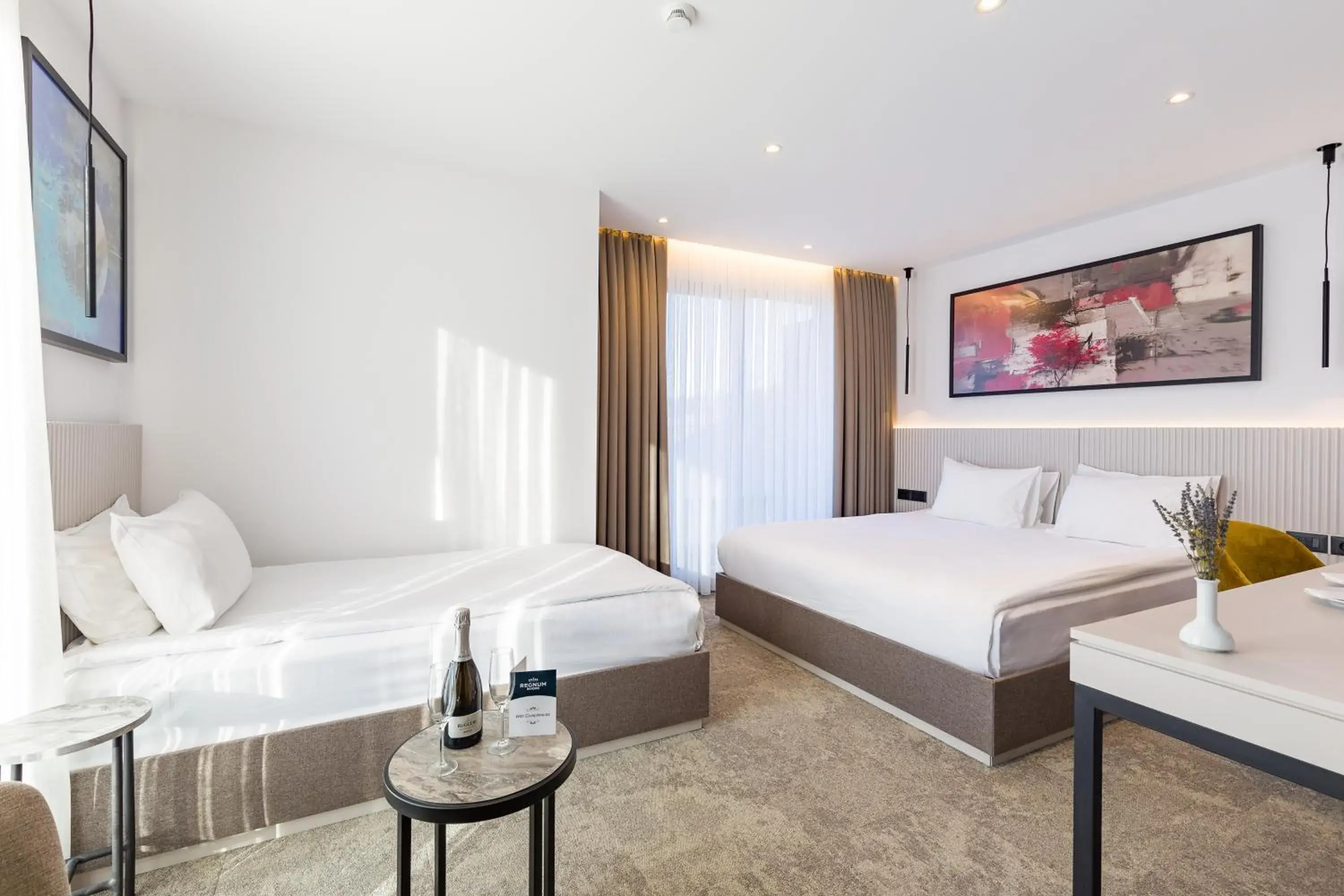 Deluxe Triple Room with Terrace in Regnum Banya Thermal Hotel Deluxe Triple Room with Terrace in Regnum Banya Thermal Hotel