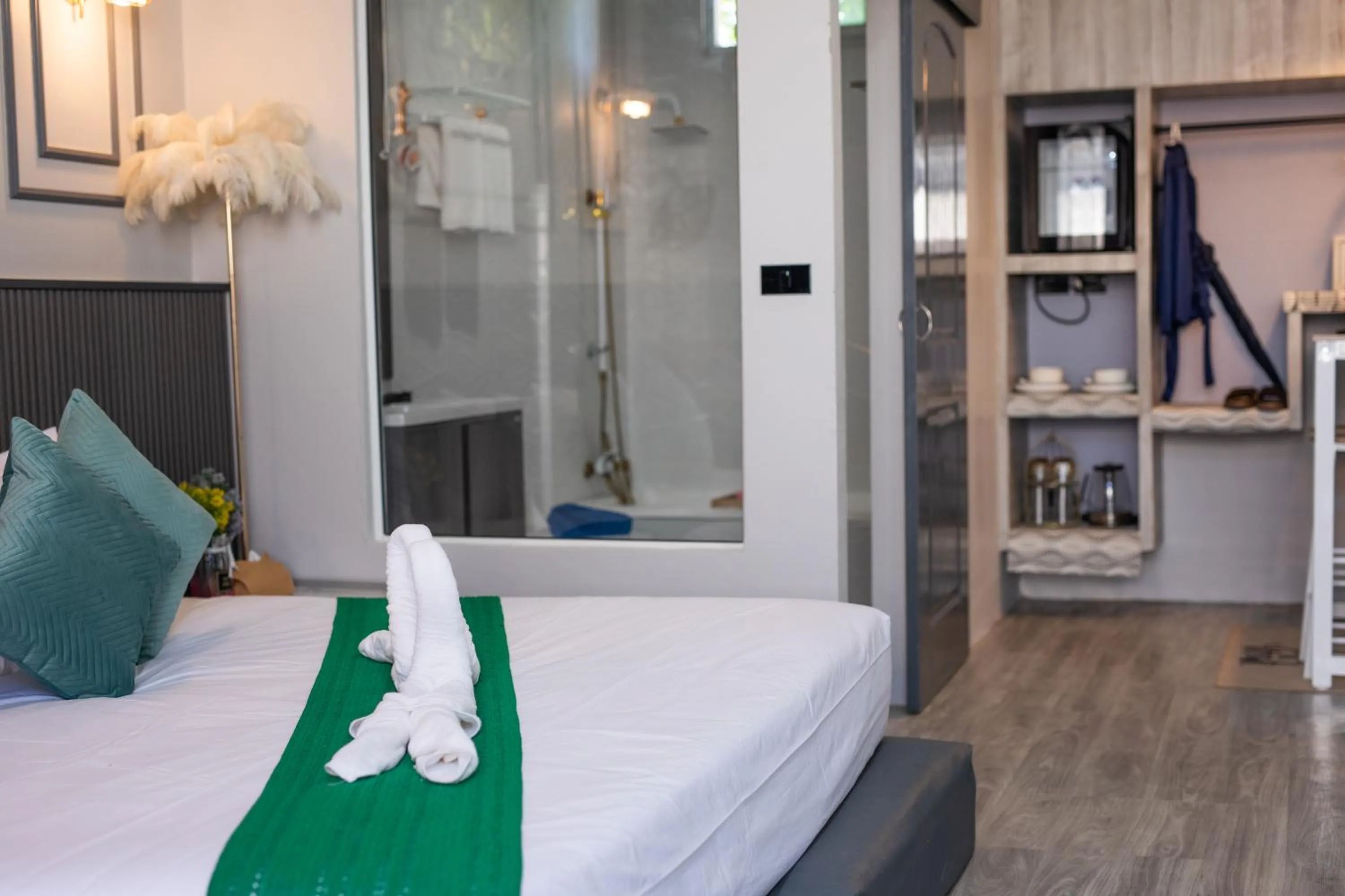 Bed in Best Time Pool Suites