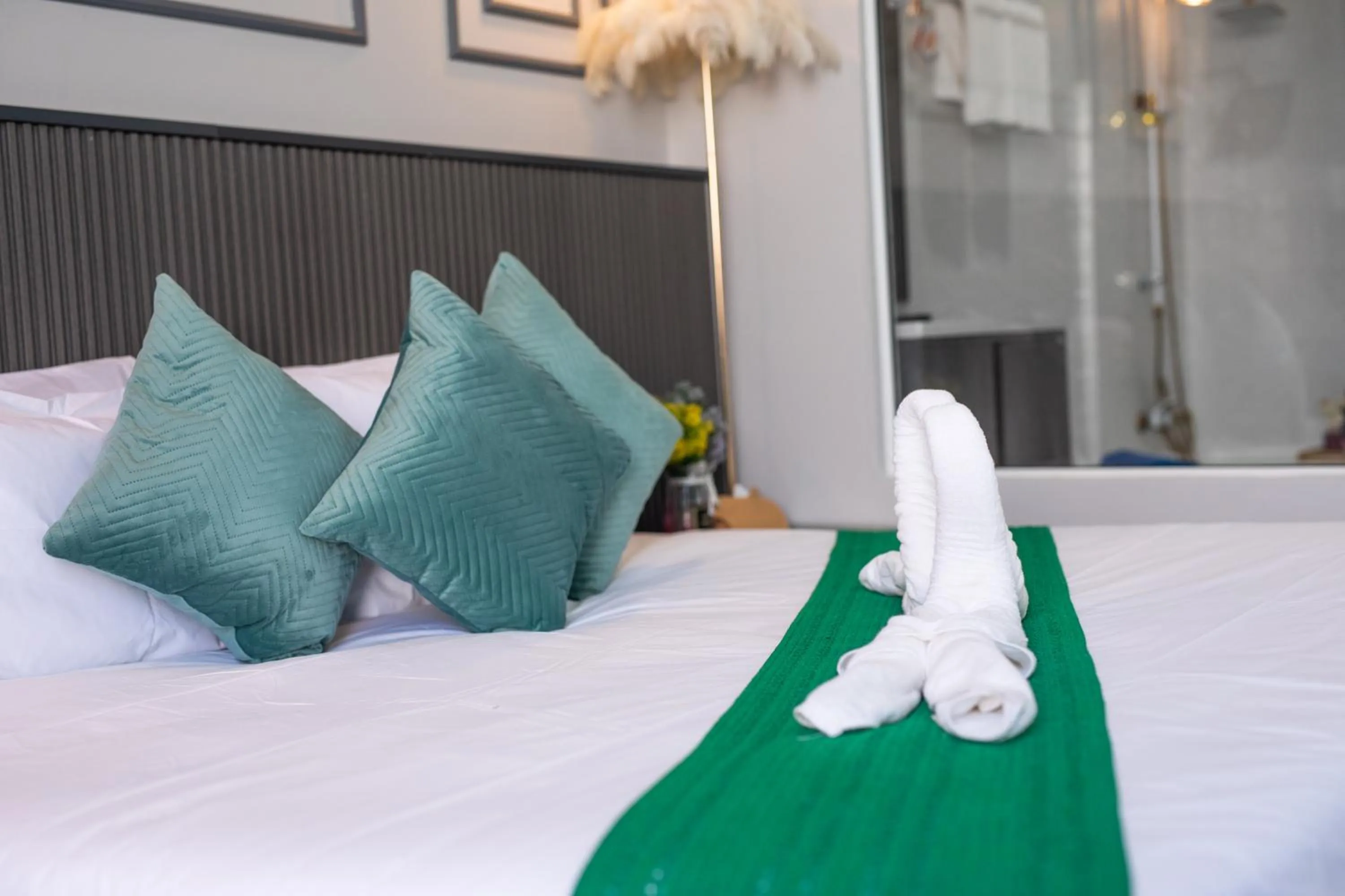 Bed in Best Time Pool Suites