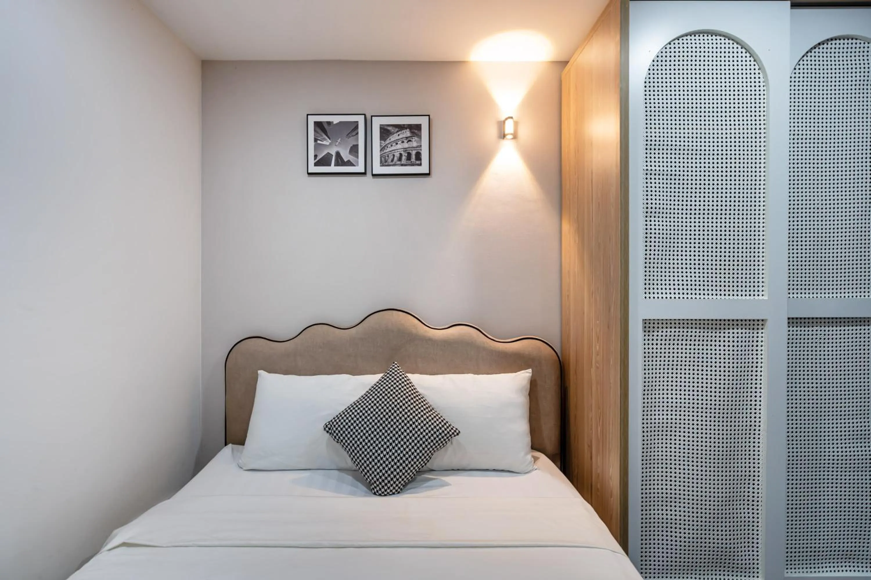 Bed in Lotus Lalala Inn Hotel