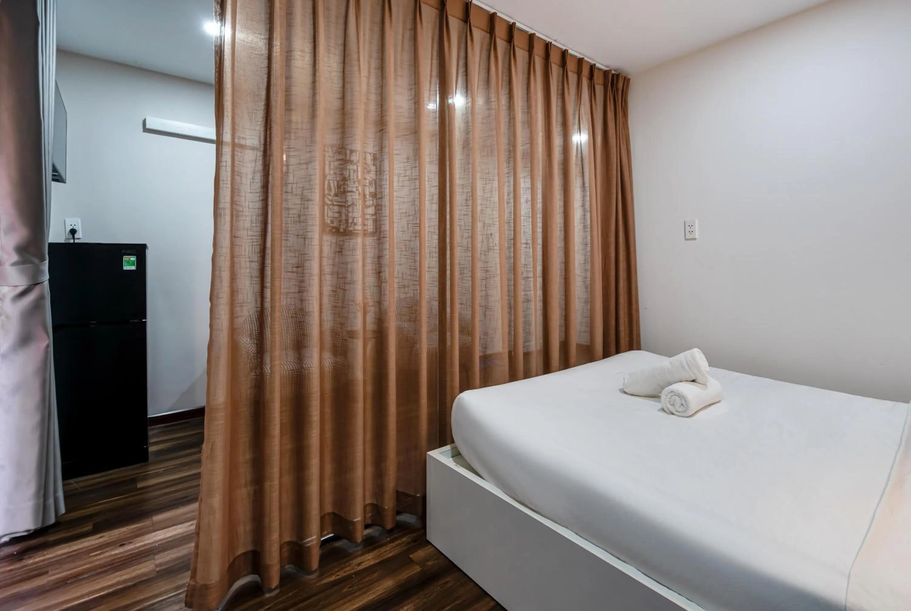 Bed in Lotus Lalala Inn Hotel