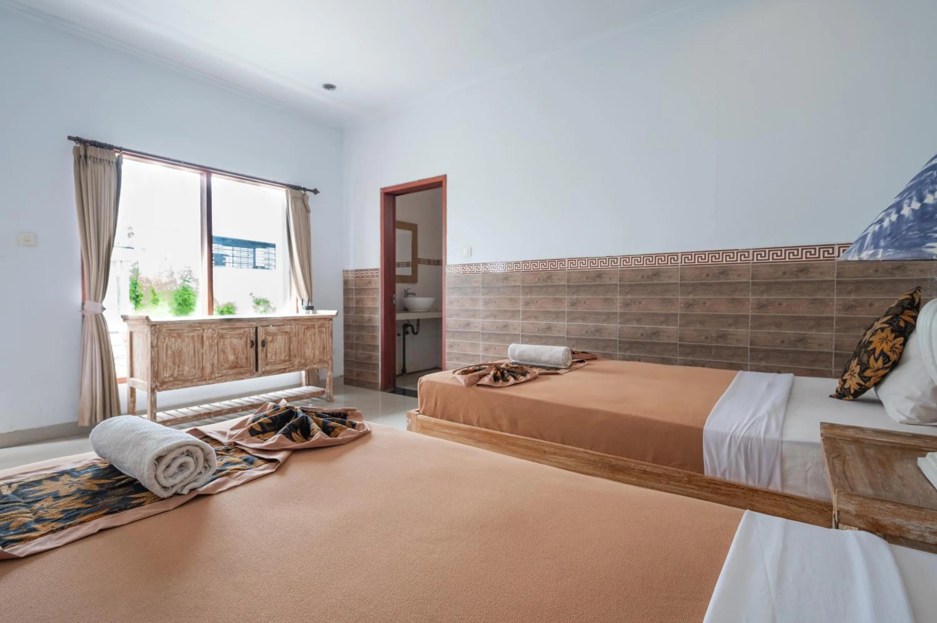 Bedroom, Bed in Agung Homestay Canggu Mitra RedDoorz