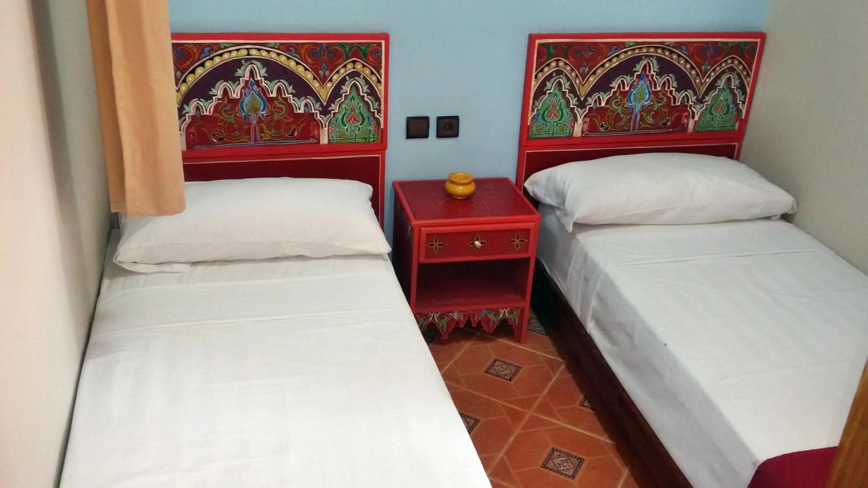 Bed in Hotel Maram