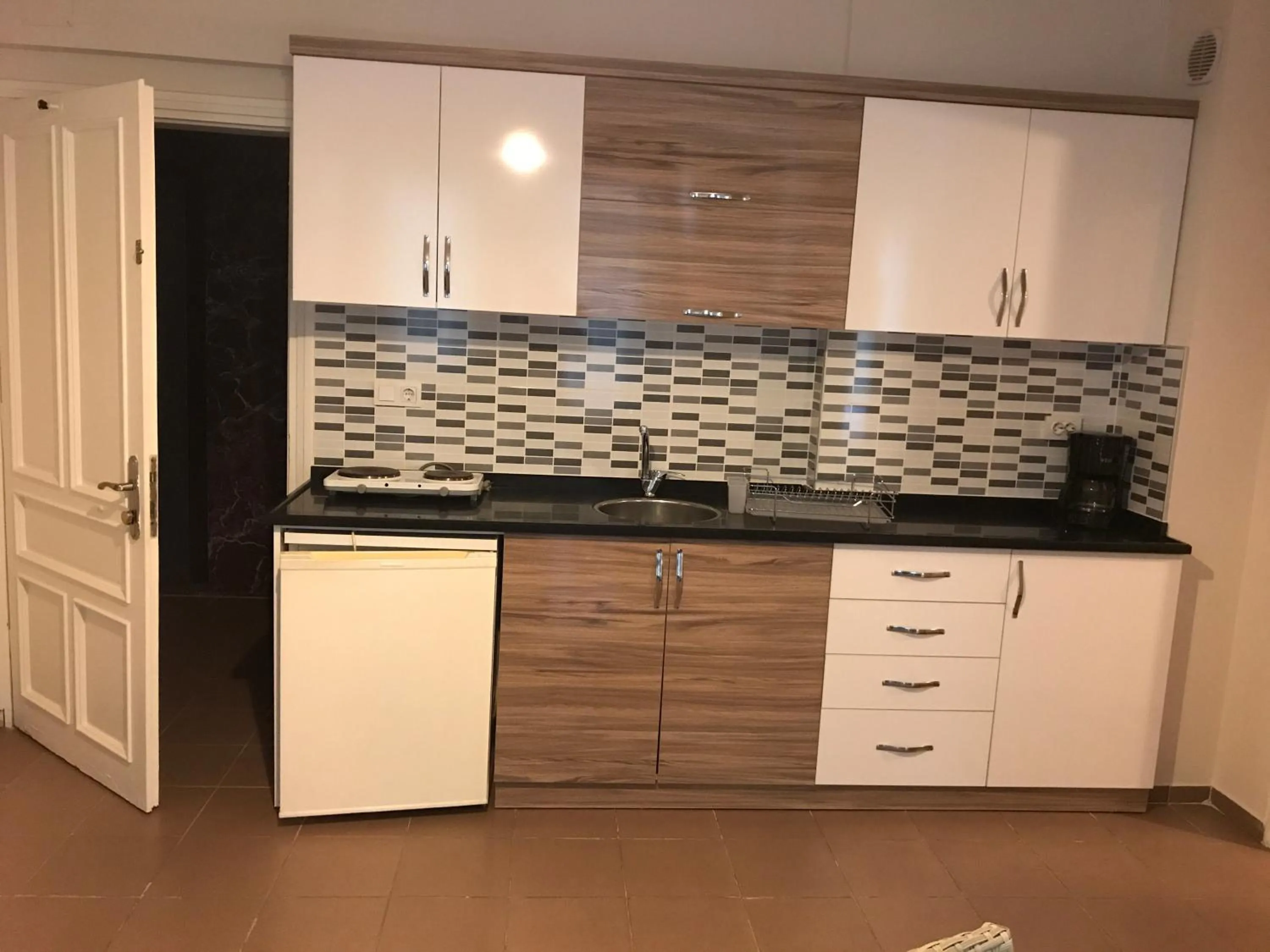 Kitchen or kitchenette in Narcis Apart Hotel