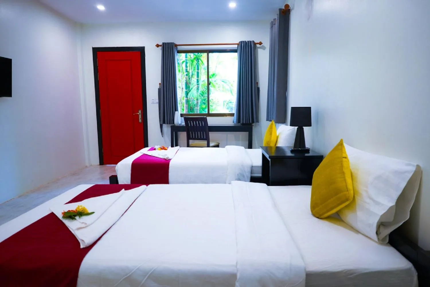 Bed in The Cockatoo Nature Resort & Spa