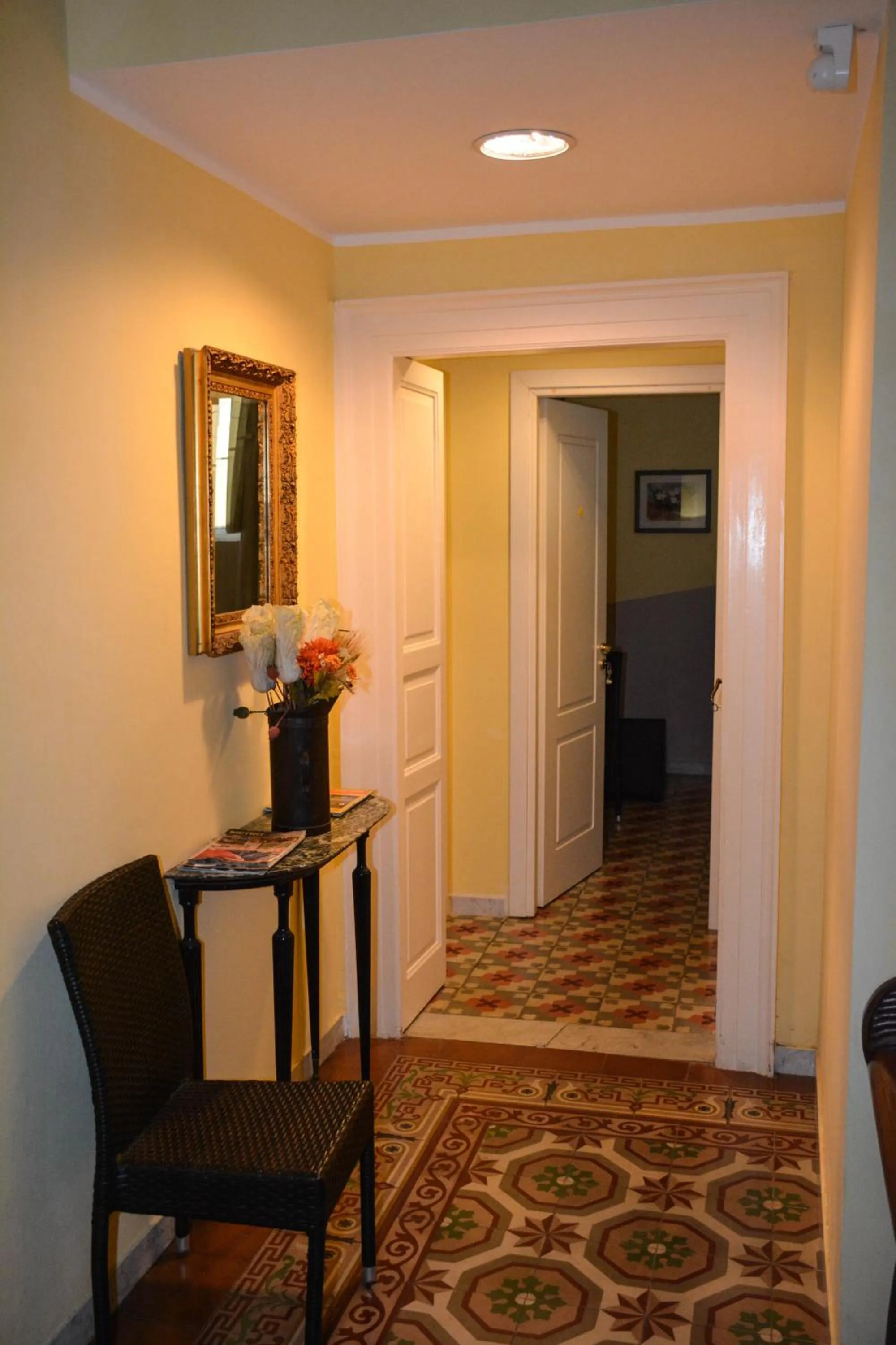 Communal lounge/ TV room in B&B Le Colonne