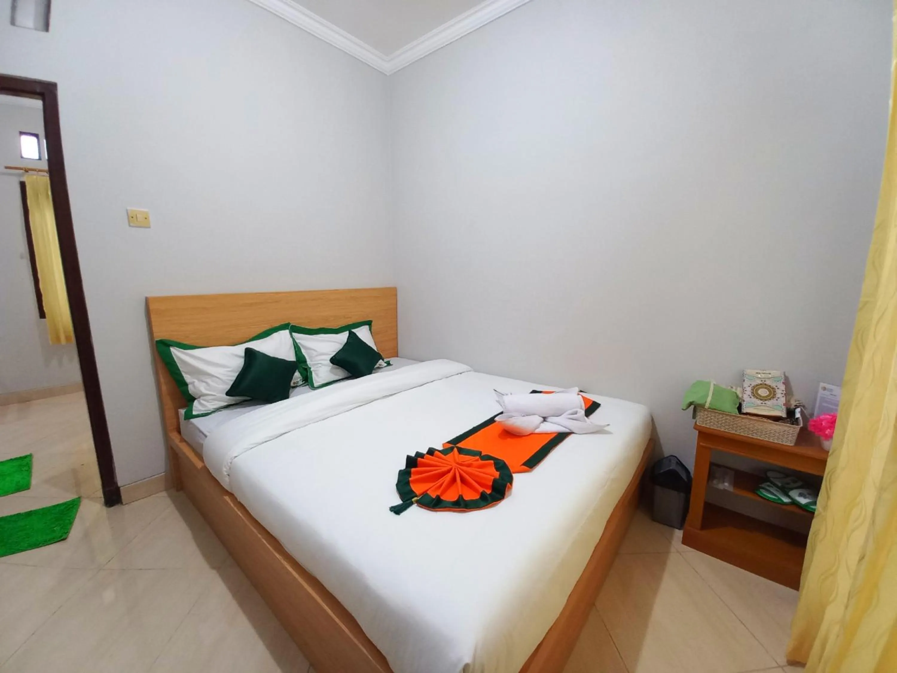 Bed in Homestay Syariah Dekat Monjali dan Jogja City Mall by Simply Homy