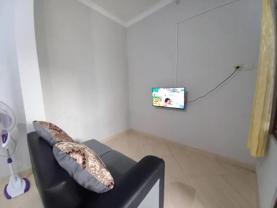 TV and multimedia in Homestay Syariah Dekat Monjali dan Jogja City Mall by Simply Homy