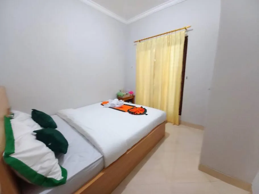 Bed in Homestay Syariah Dekat Monjali dan Jogja City Mall by Simply Homy