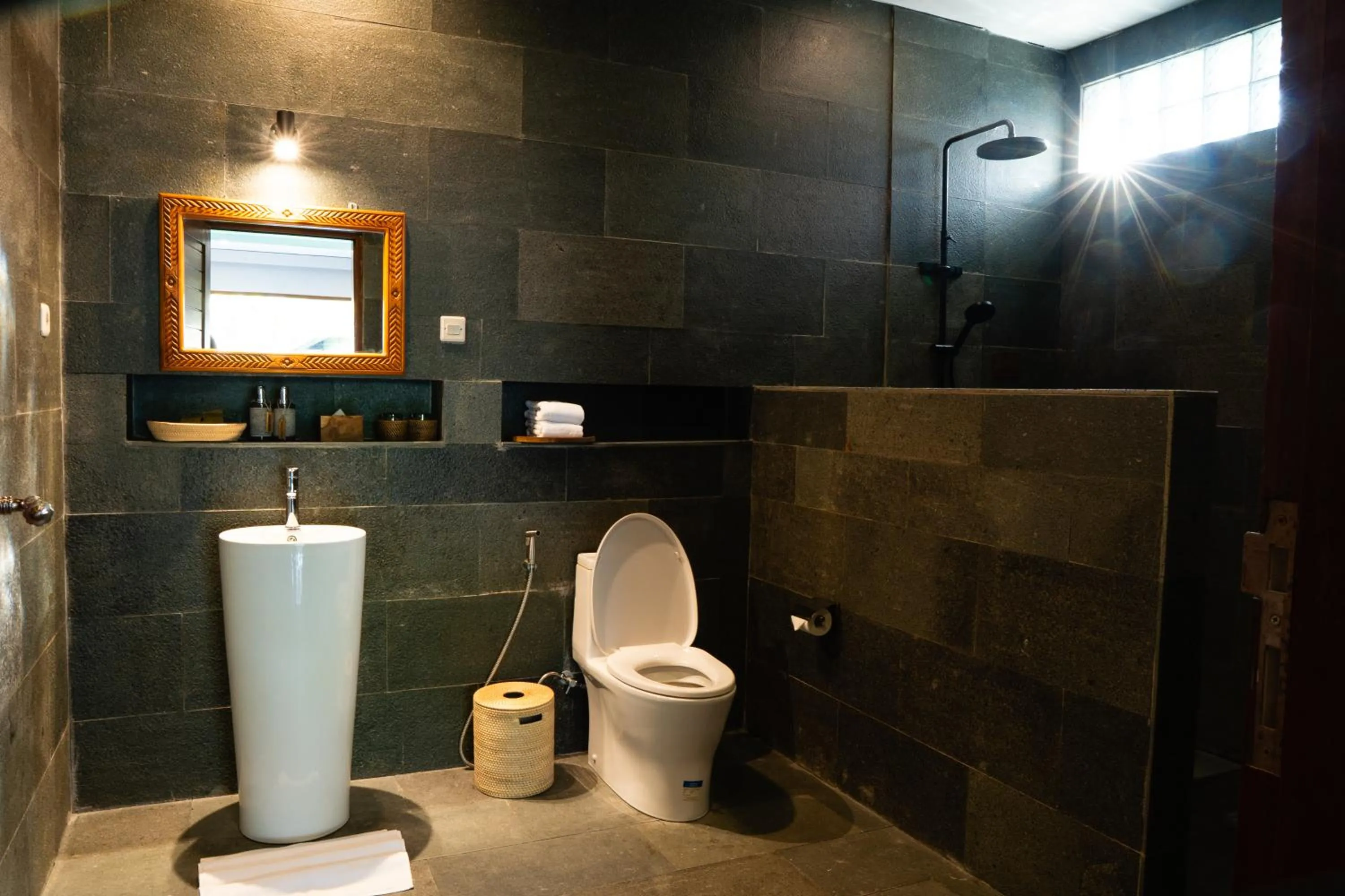 Toilet in Seaside Oceana Suites by Mahaprana