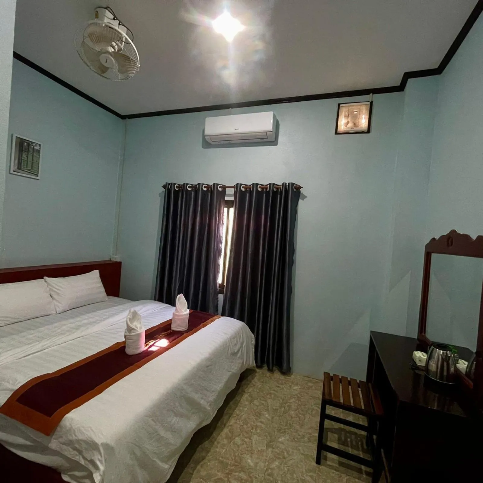 Bed in Smile Guesthouse VangVieng