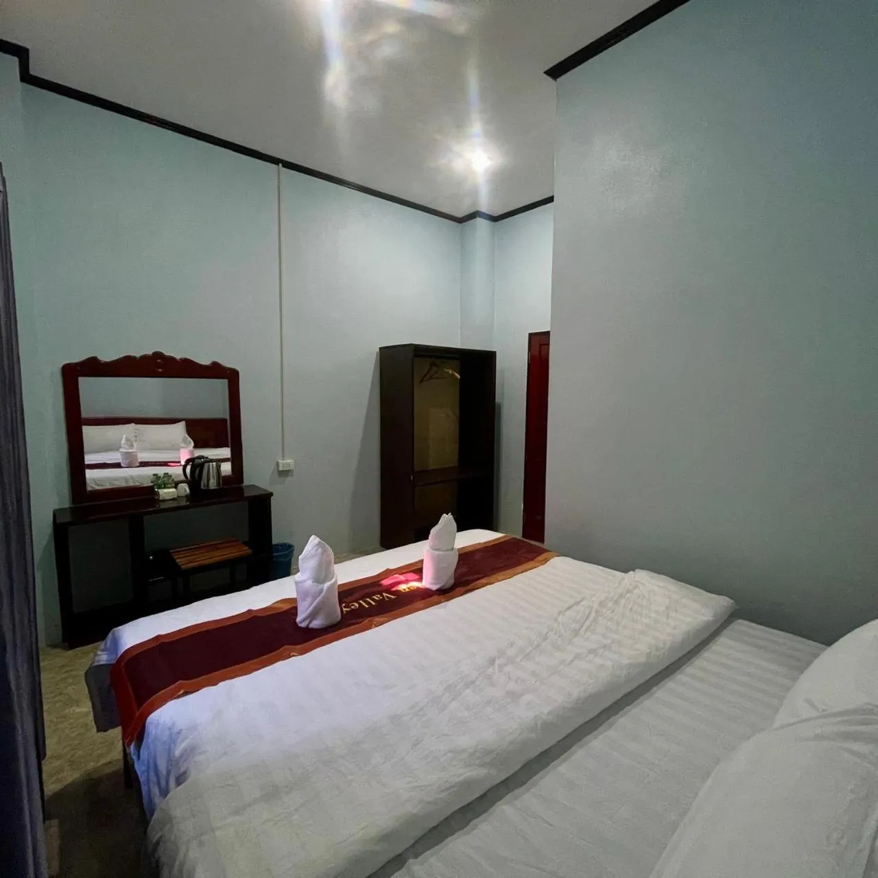 Bed in Smile Guesthouse VangVieng
