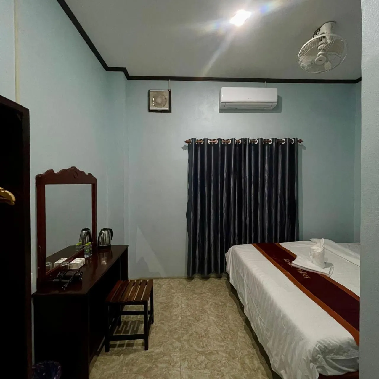 Bed in Smile Guesthouse VangVieng