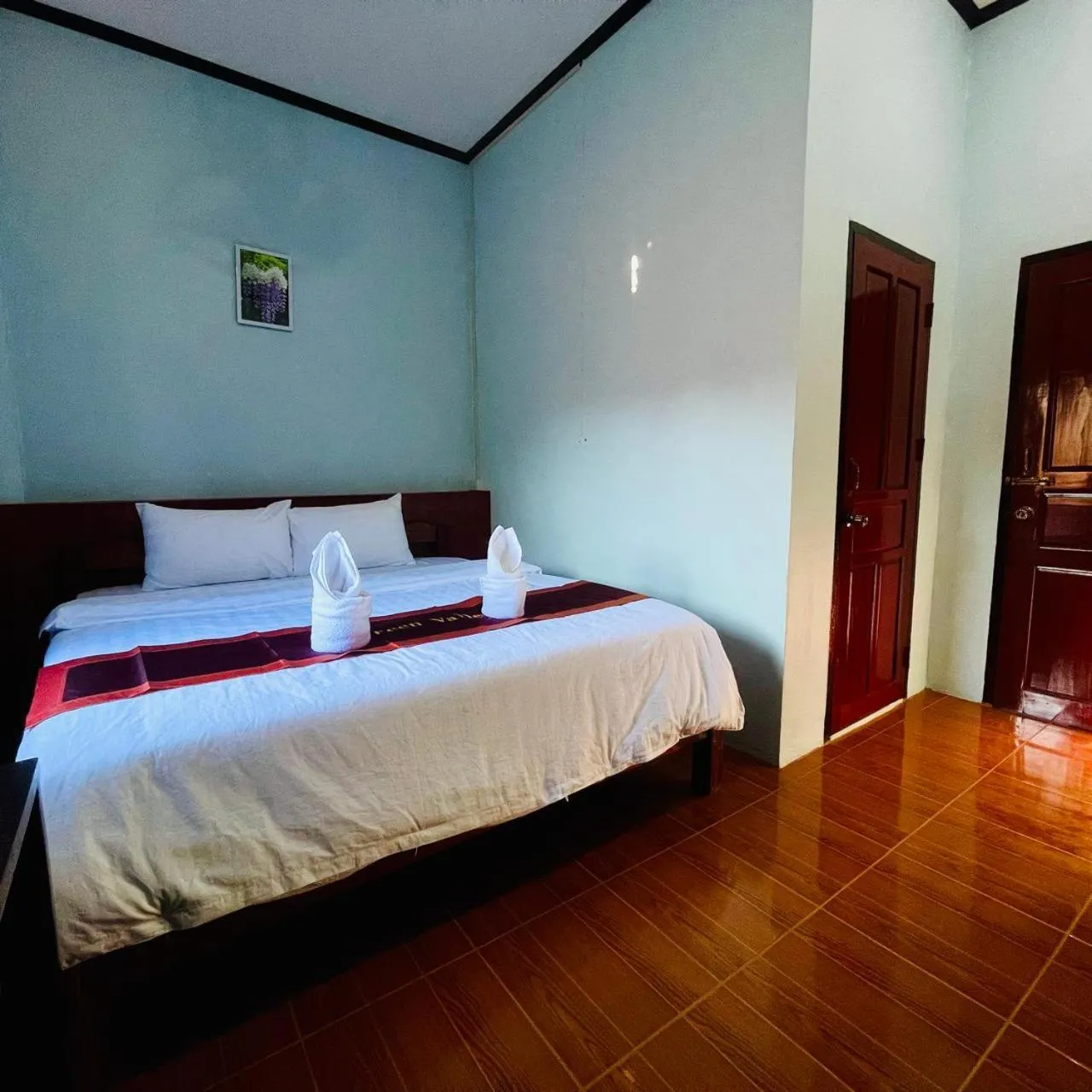 Bed in Smile Guesthouse VangVieng