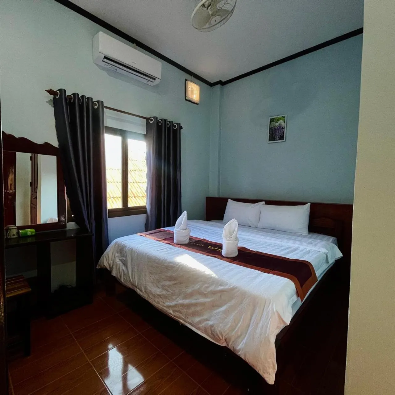 Bed in Smile Guesthouse VangVieng