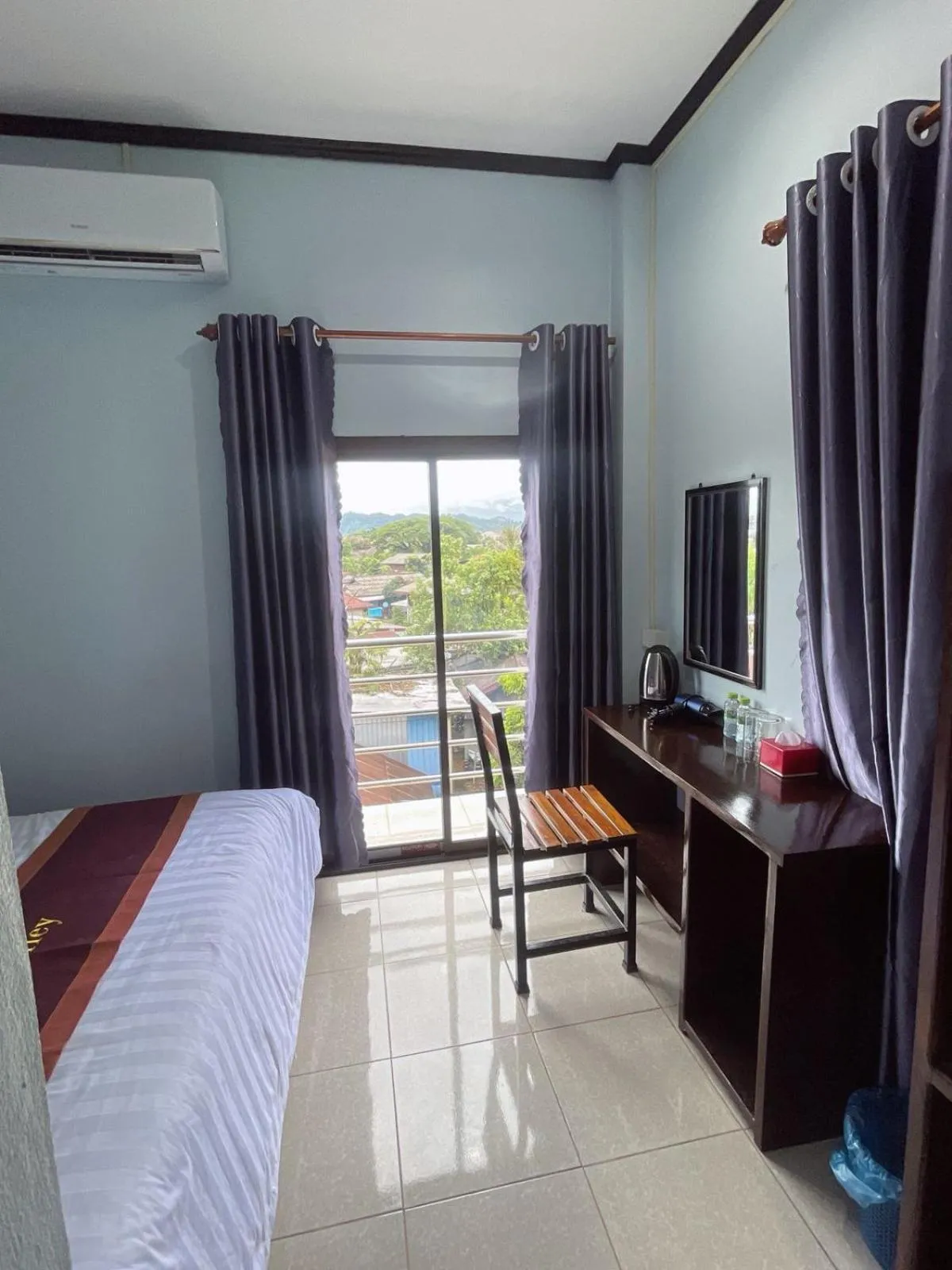 air conditioner, Bed in Smile Guesthouse VangVieng