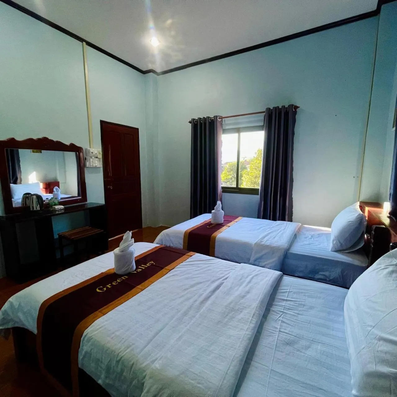 Bed in Smile Guesthouse VangVieng