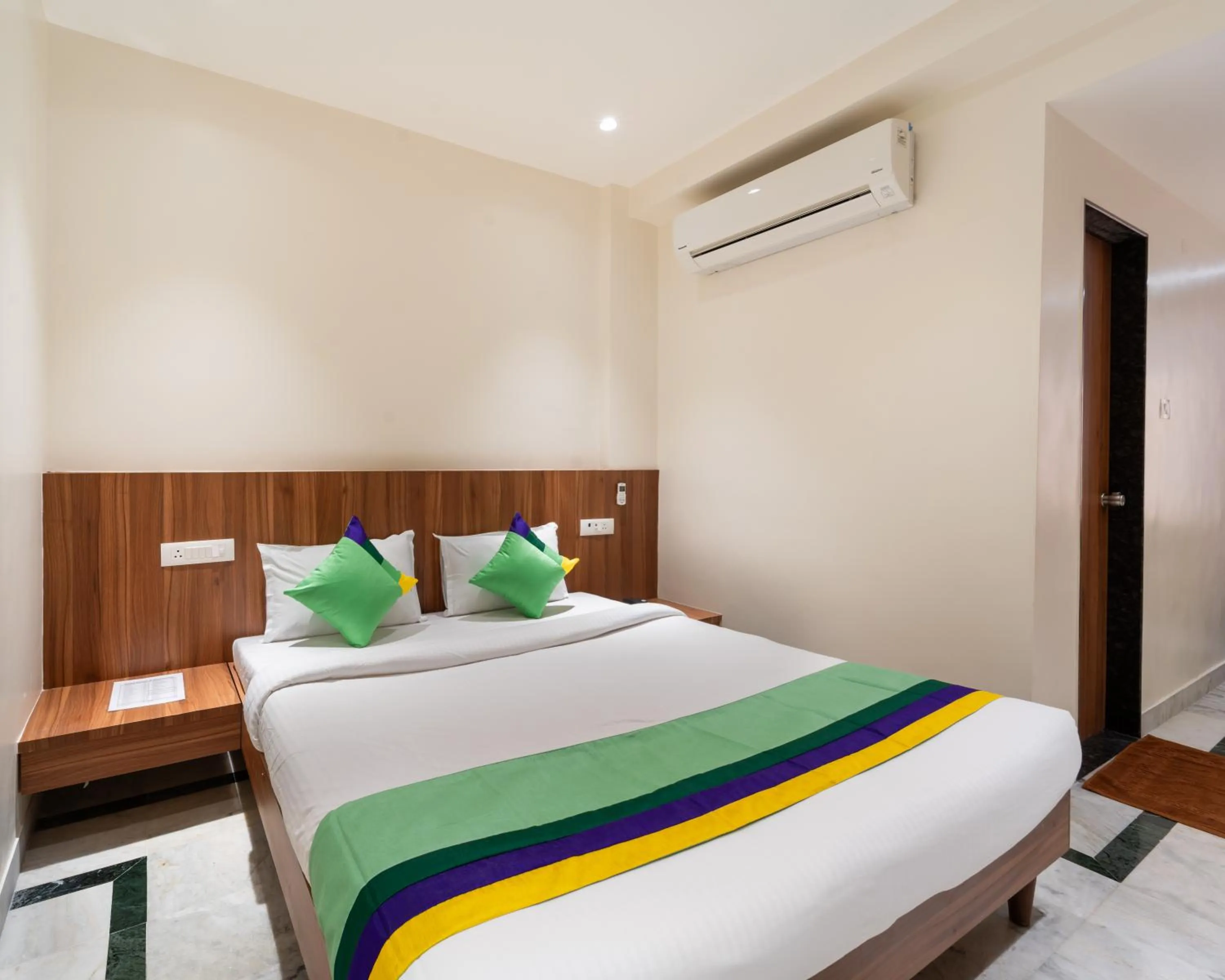 Bed in Treebo Kaveri