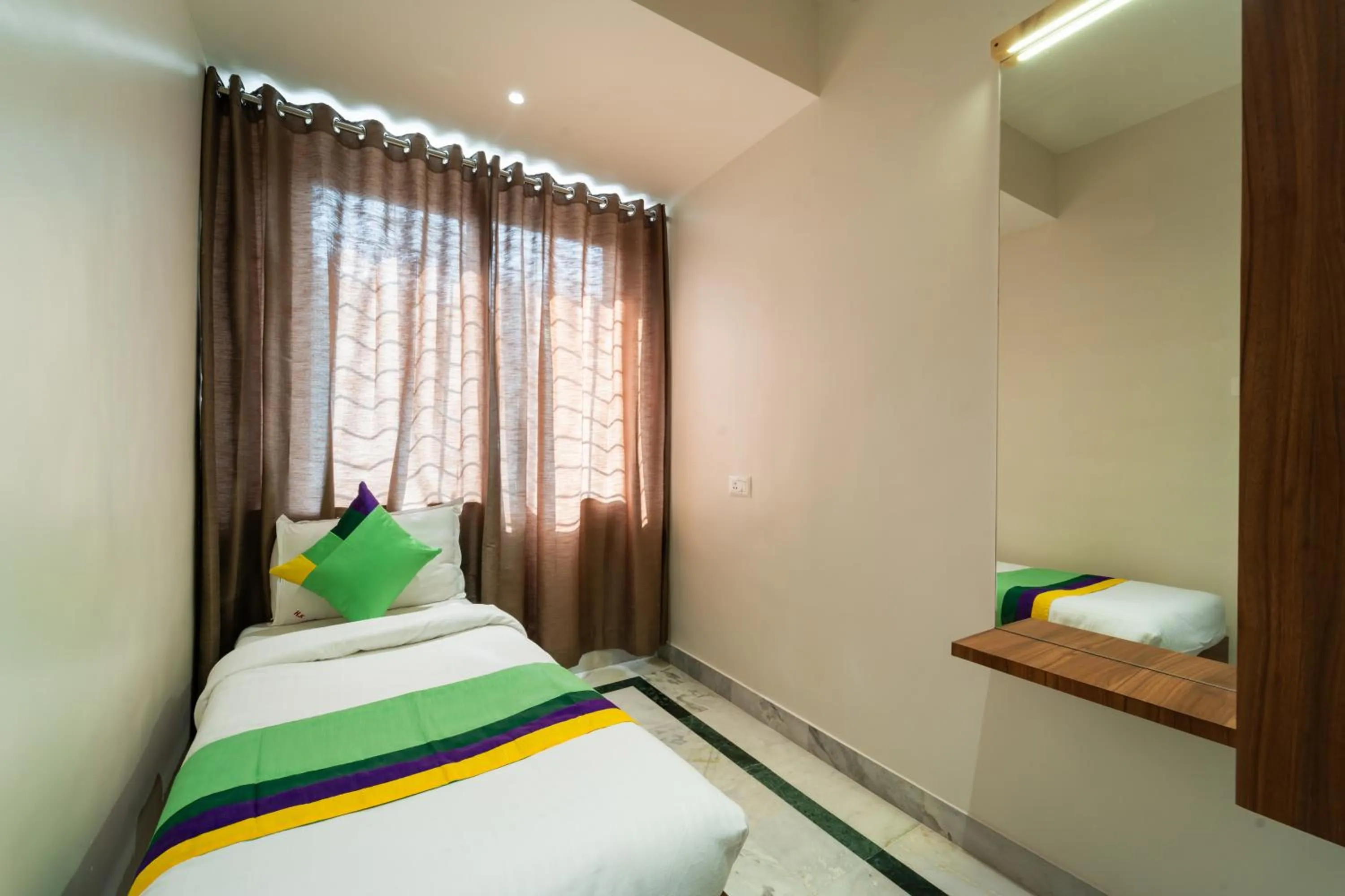 Bed in Treebo Kaveri