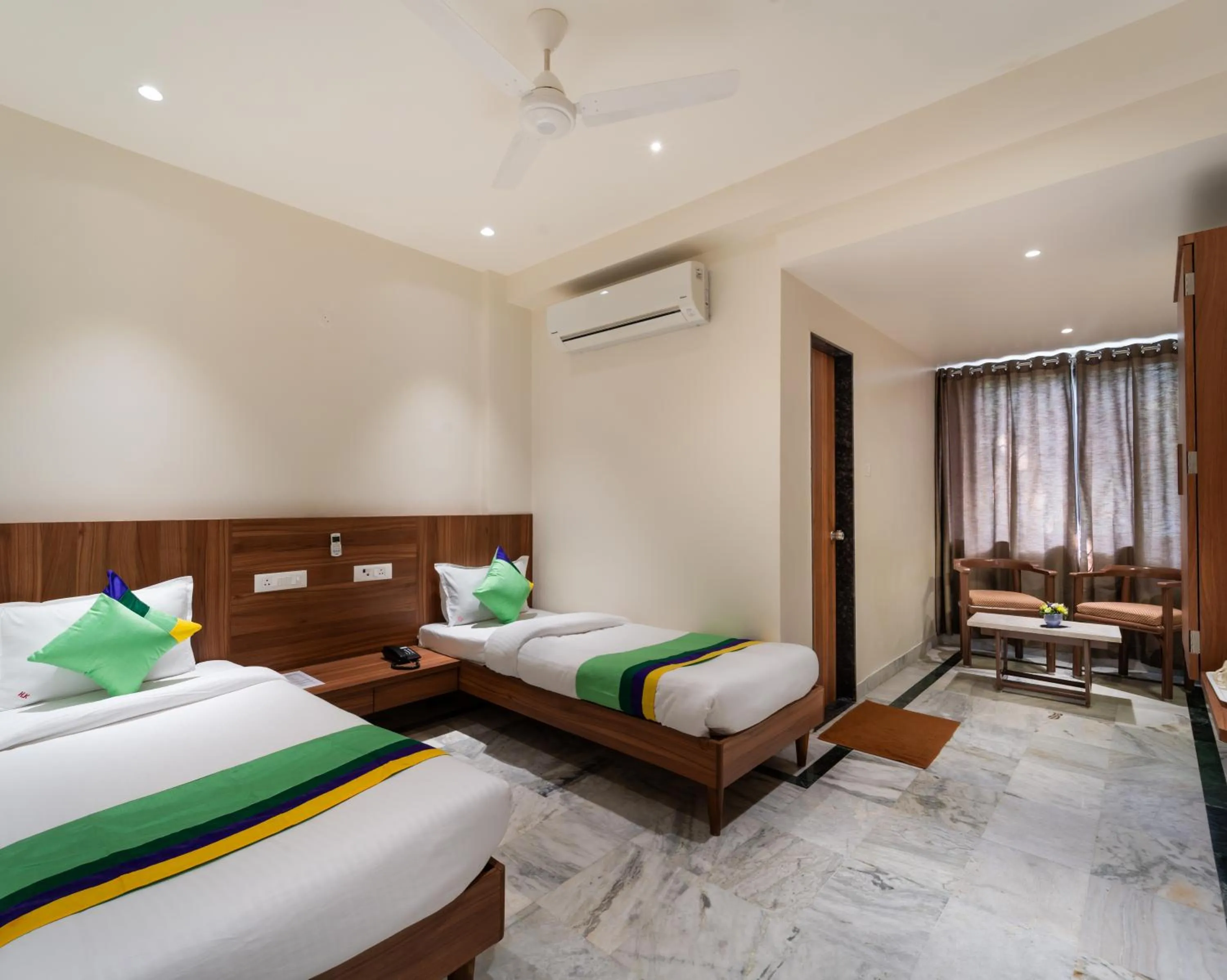 Bed in Treebo Kaveri