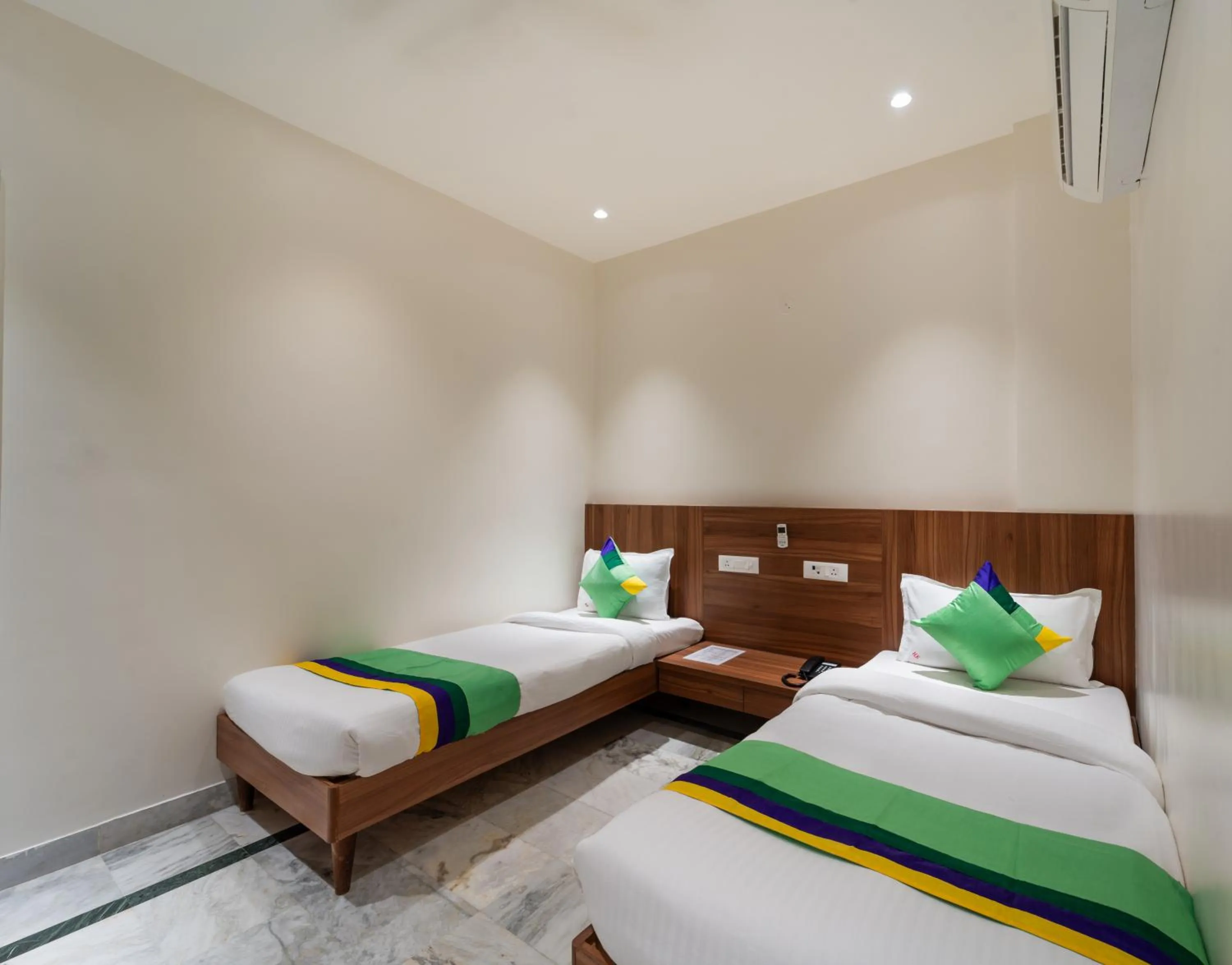 Bed in Treebo Kaveri