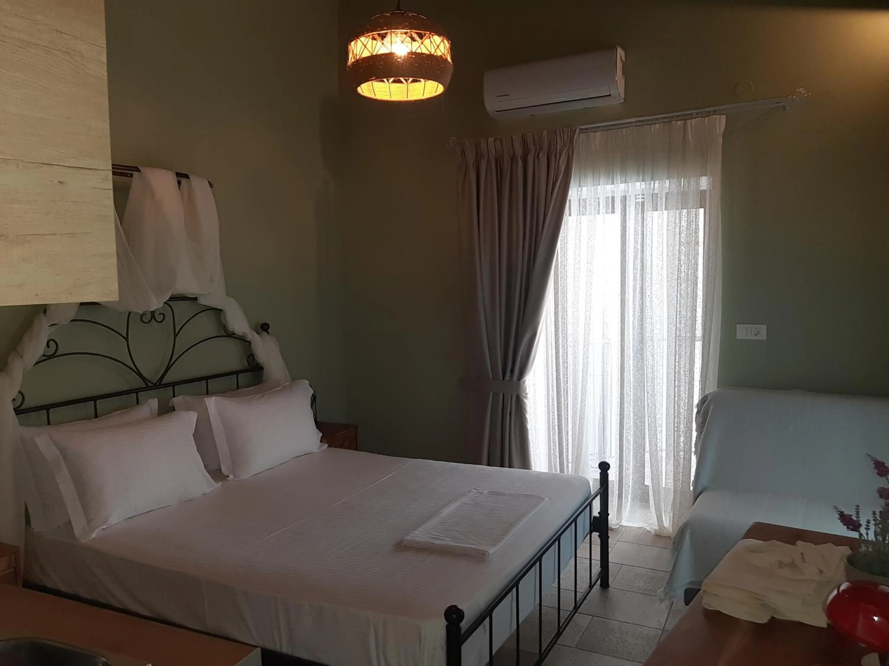 Bed in Paraskevi's Luxury Studios