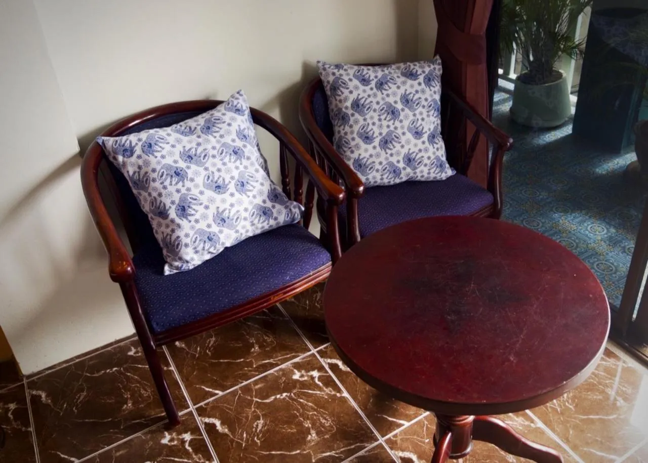 Seating area in Sugar and Spice Inn