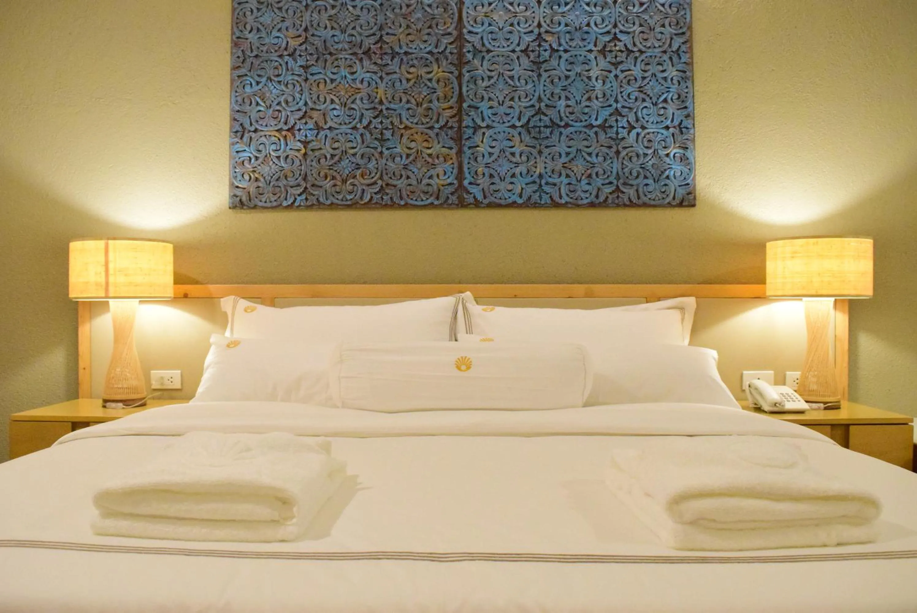 Bed in Pearl Vista de Coron Resort Hotel