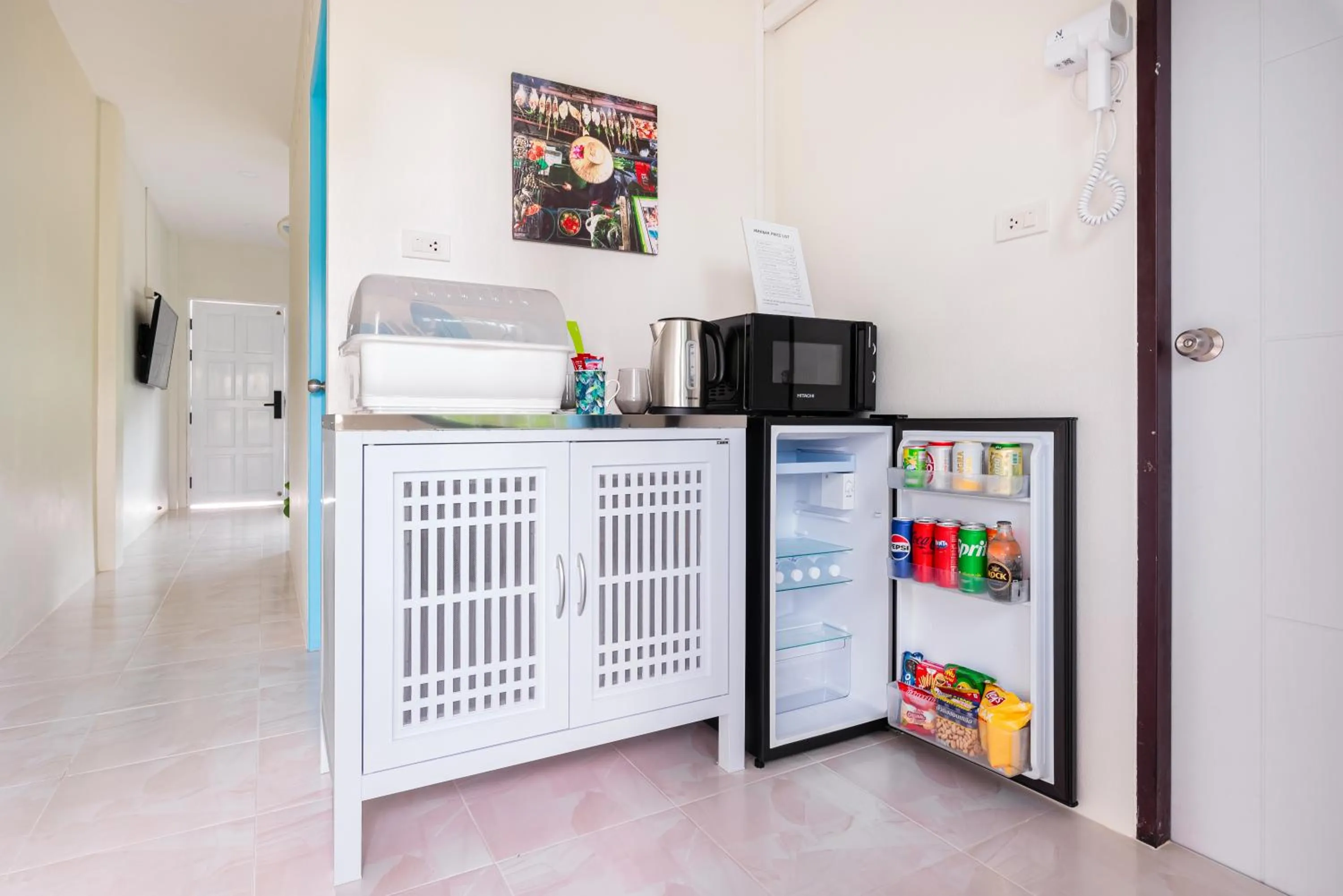 Kitchen or kitchenette in Songbird Suites