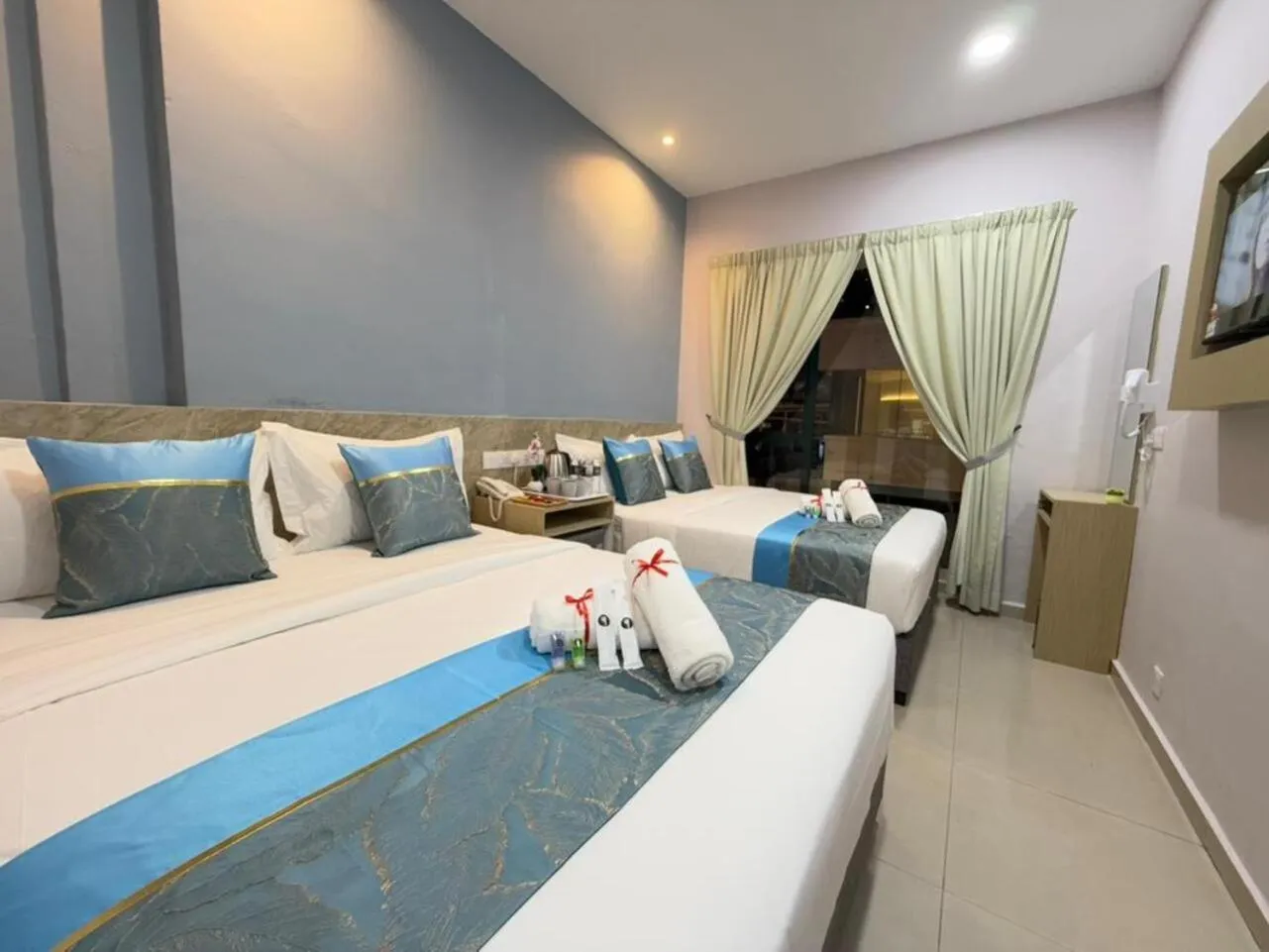 Photo of the whole room, Bed in AQ Hotel