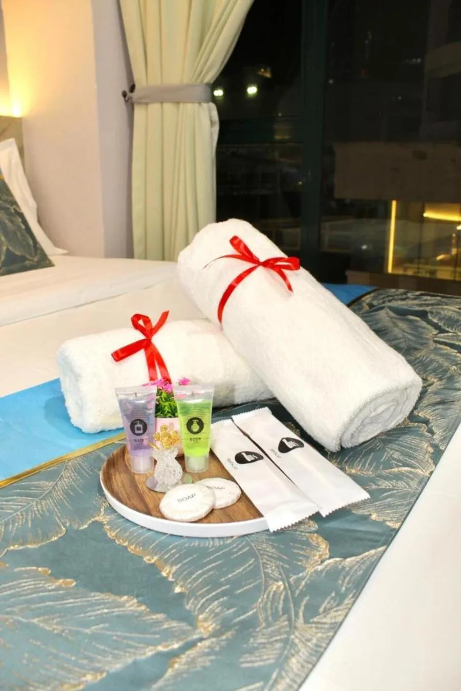 towels, Bed in AQ Hotel