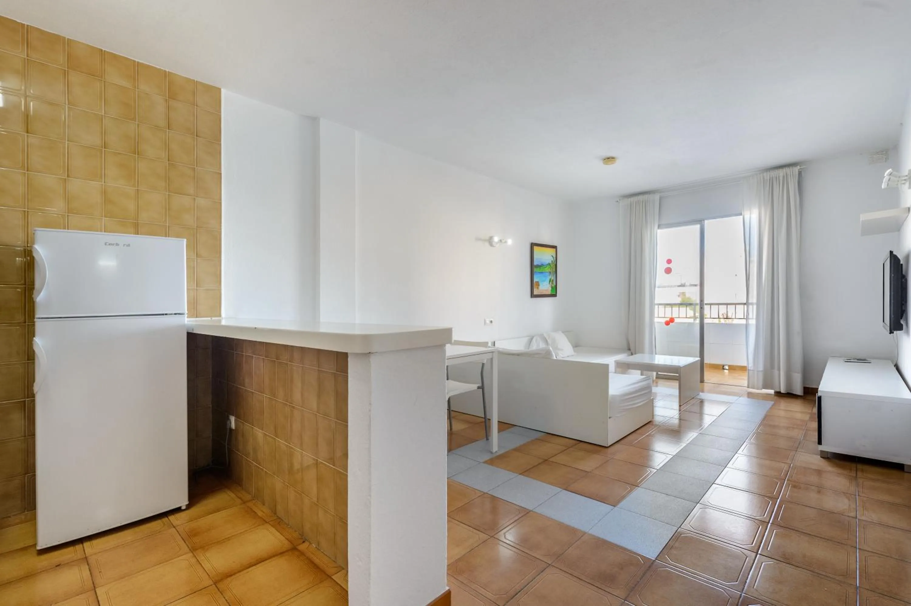 Living room in Apartamentos San Antonio Beach