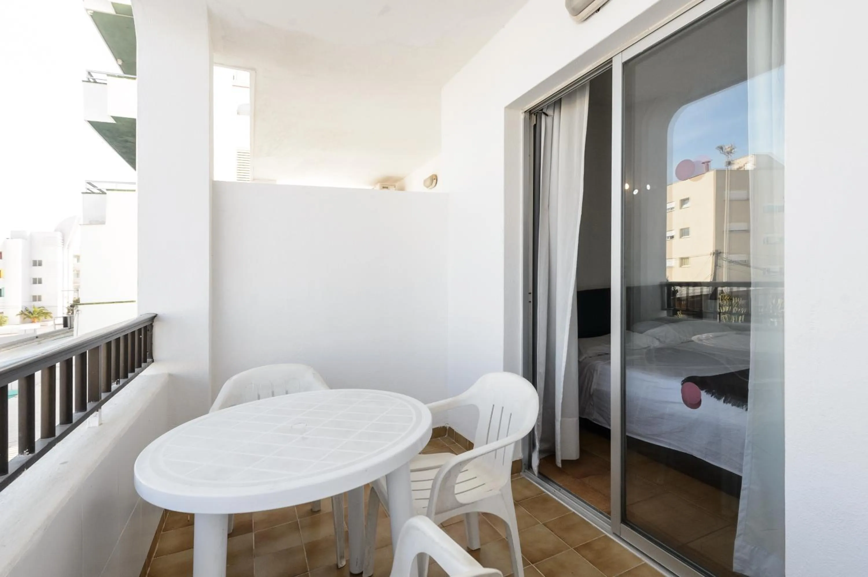 Balcony/Terrace, Bed in Apartamentos San Antonio Beach