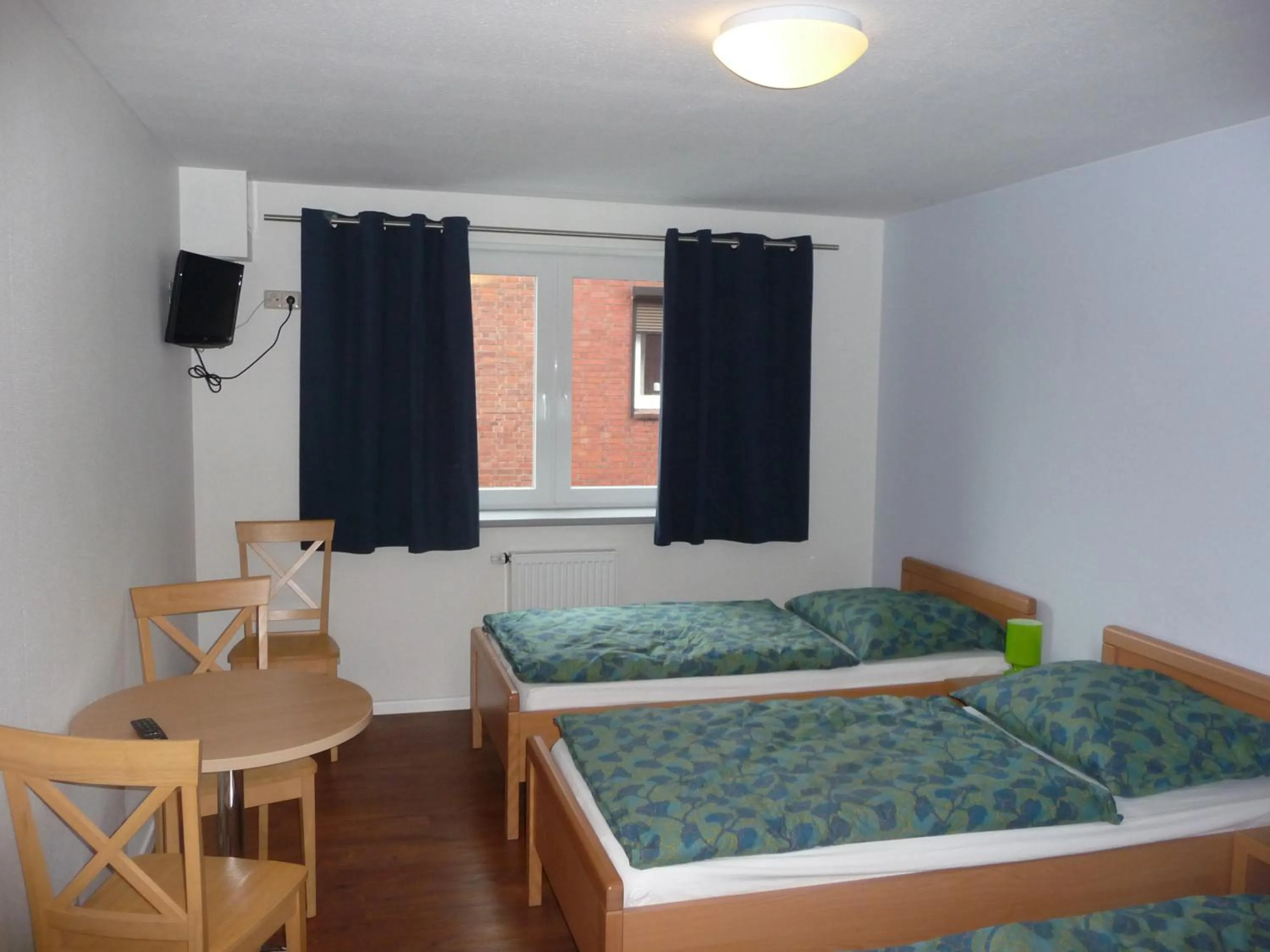 Photo of the whole room, Bed in Hansehus