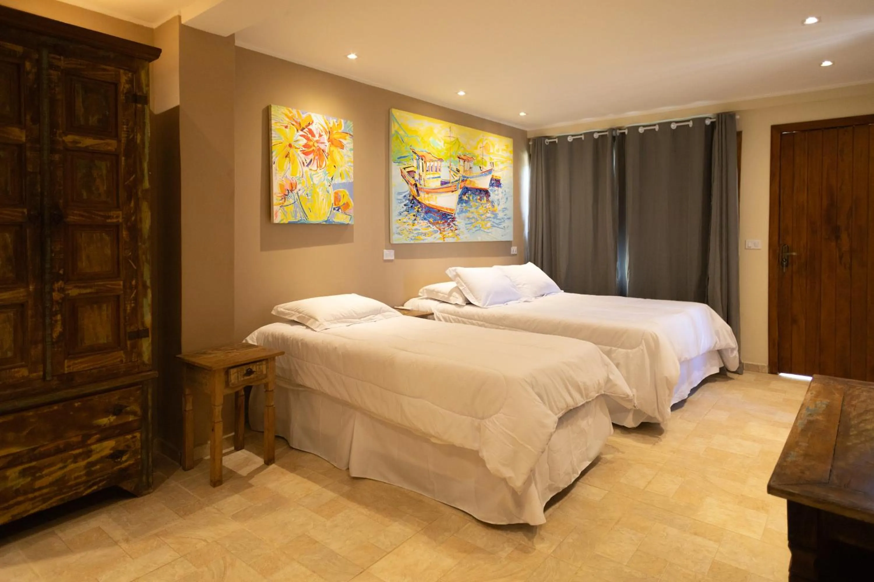 Bed in Pousada La Dolce Vita