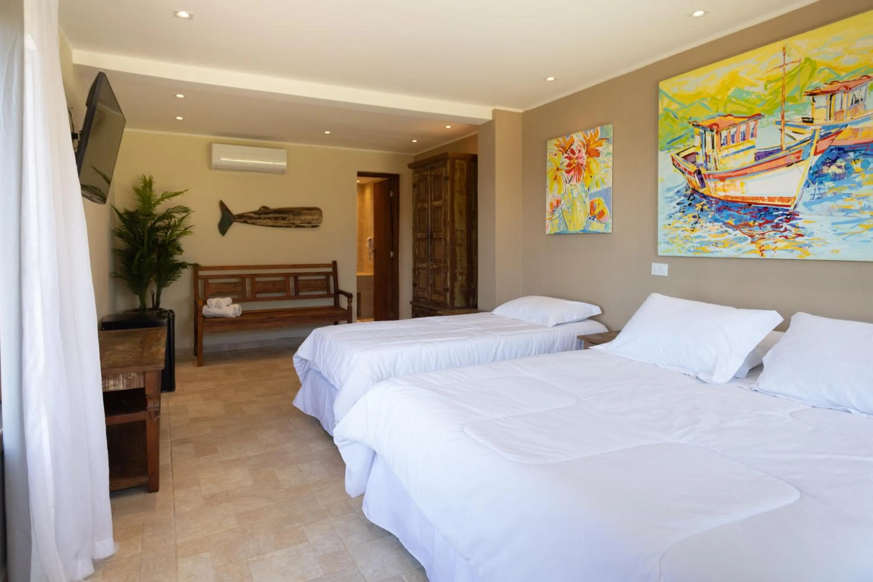 Bed in Pousada La Dolce Vita