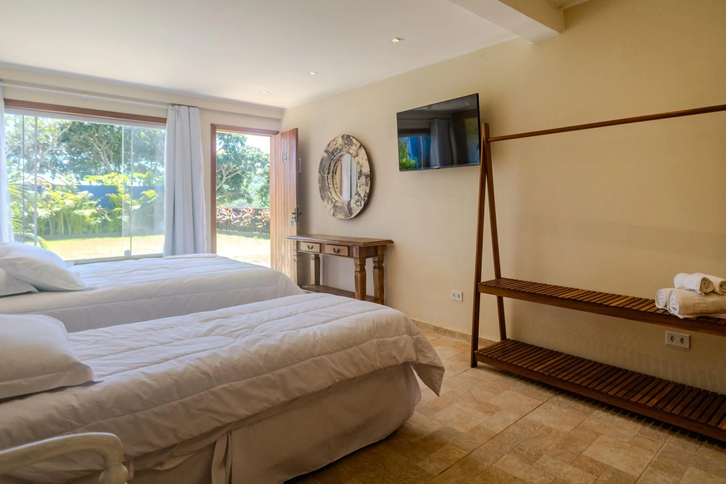 Bed in Pousada La Dolce Vita