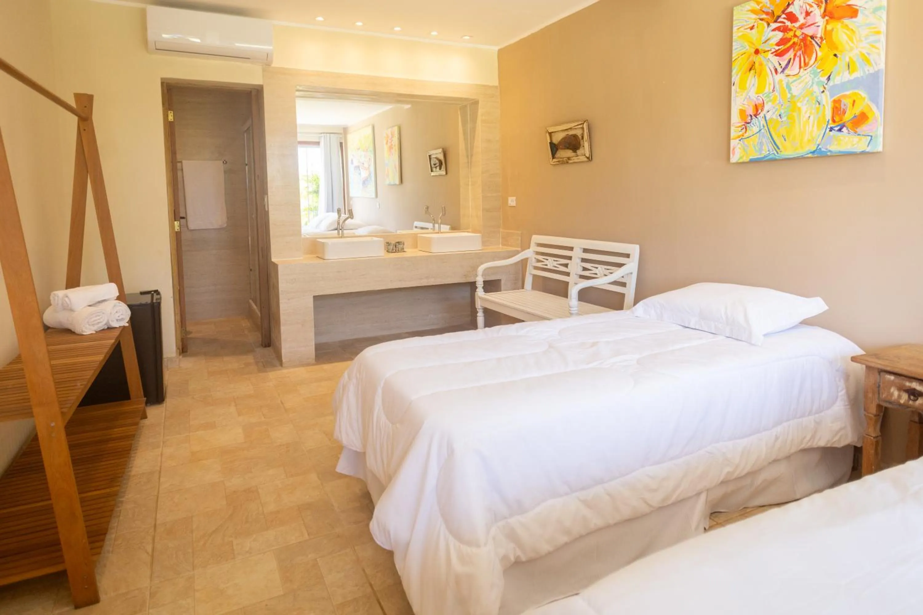 Bed in Pousada La Dolce Vita