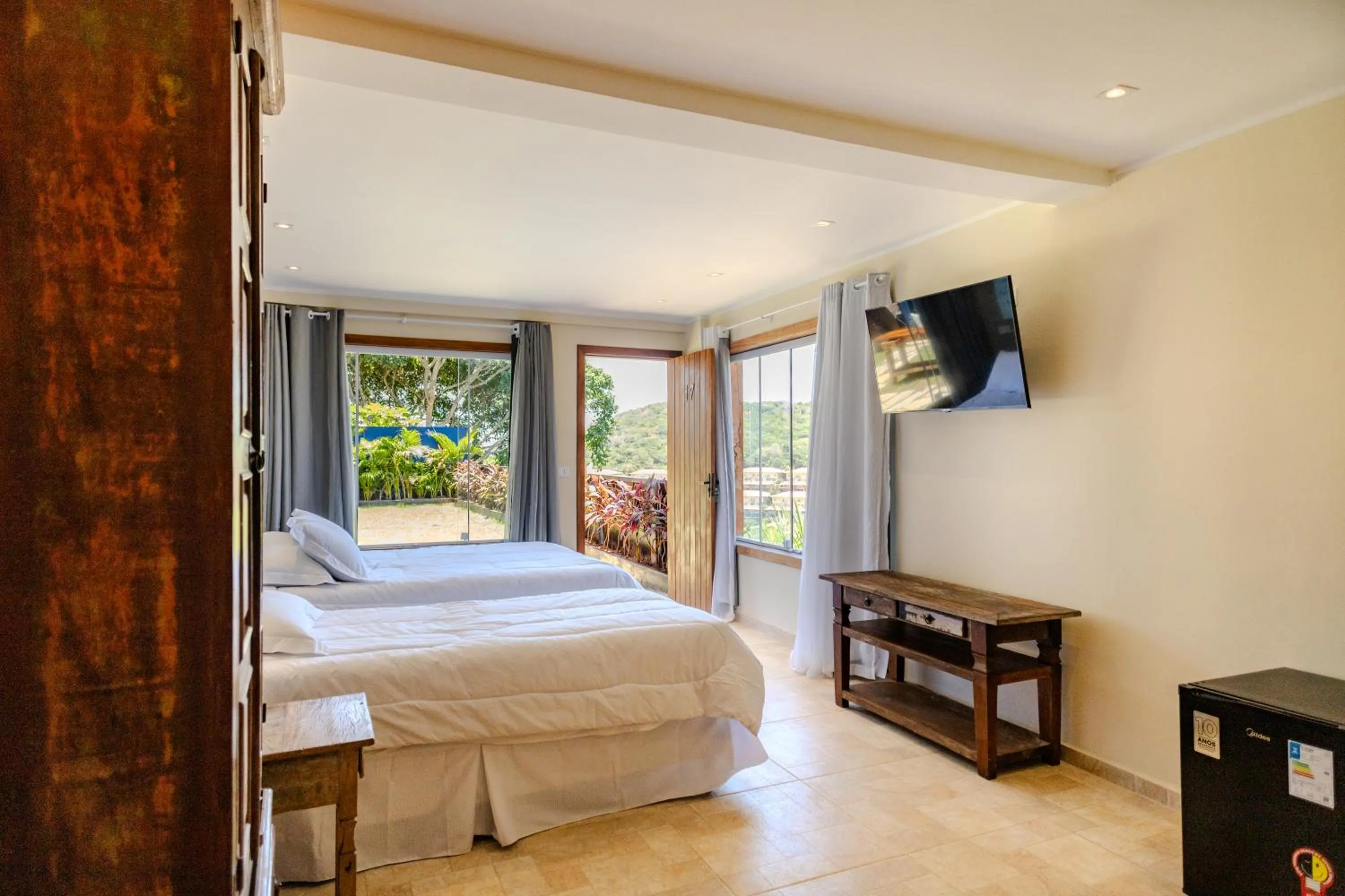 Bed in Pousada La Dolce Vita