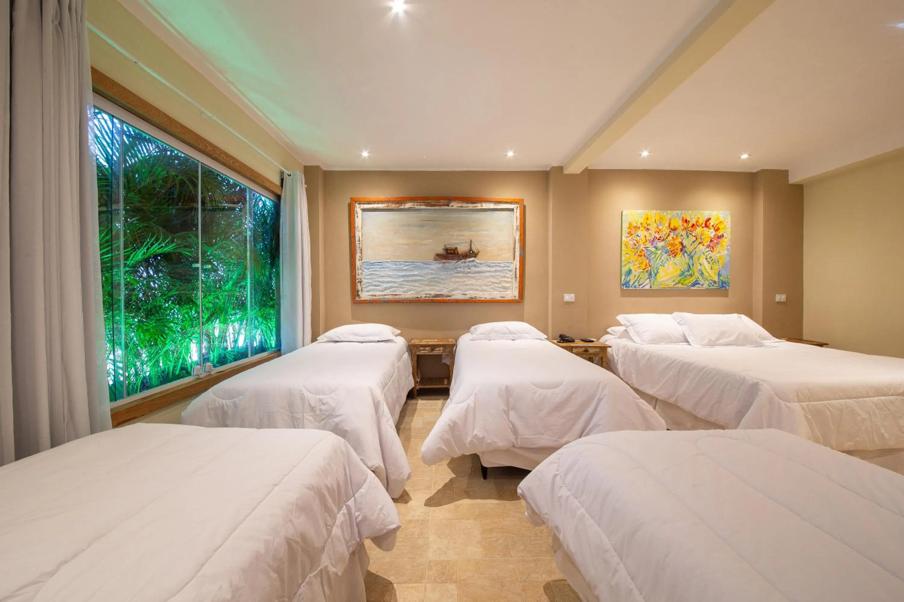 Bed in Pousada La Dolce Vita