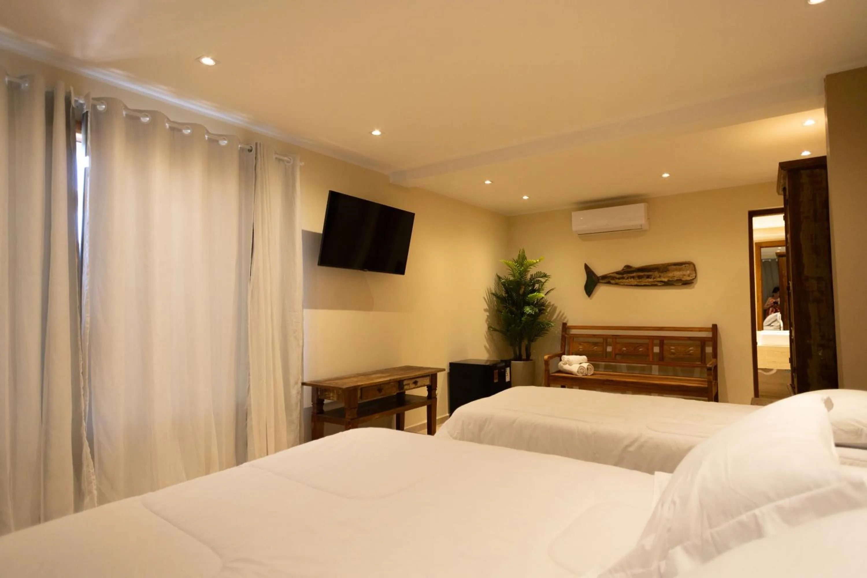 Bed in Pousada La Dolce Vita