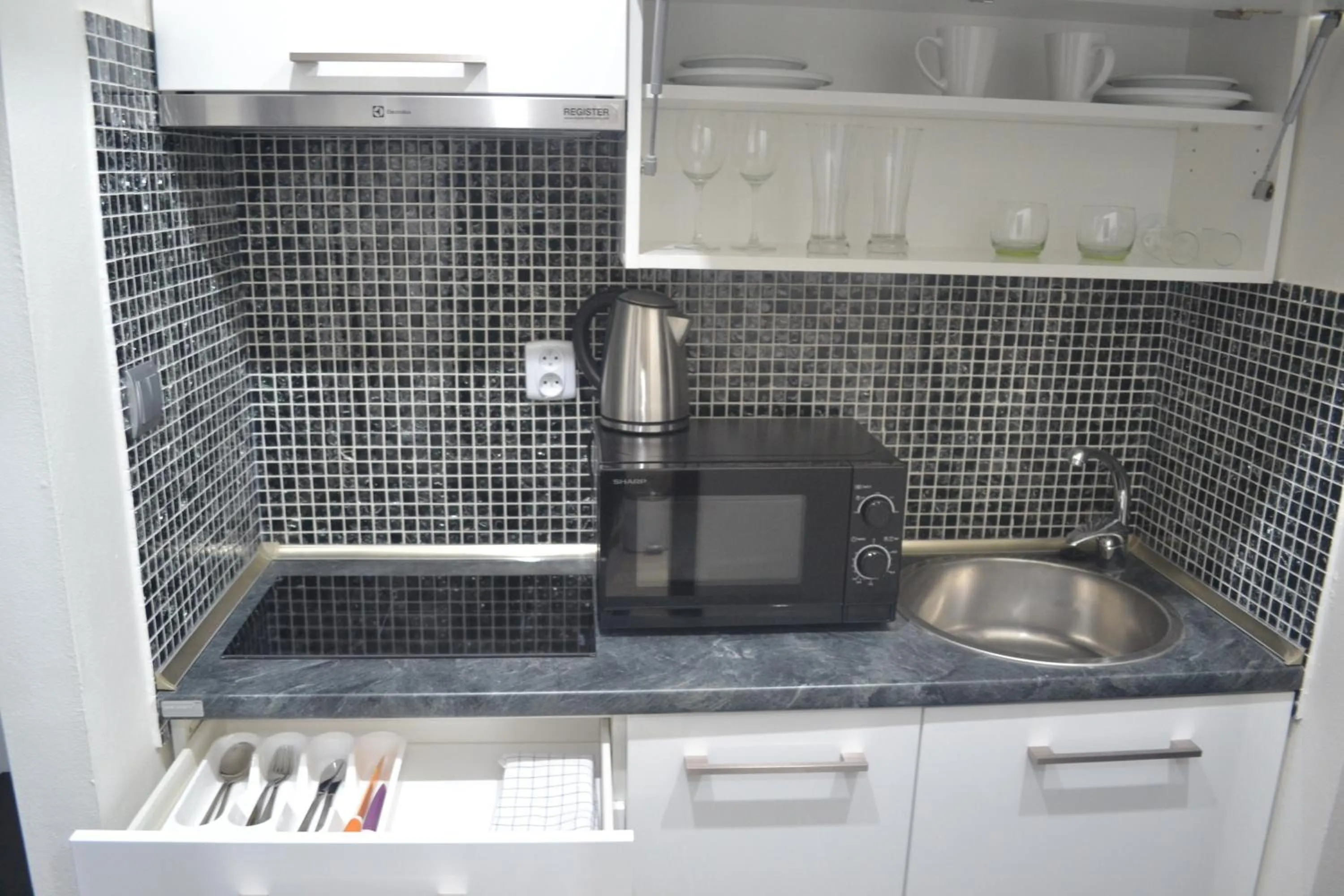 Kitchen or kitchenette in Apartmány Šariš